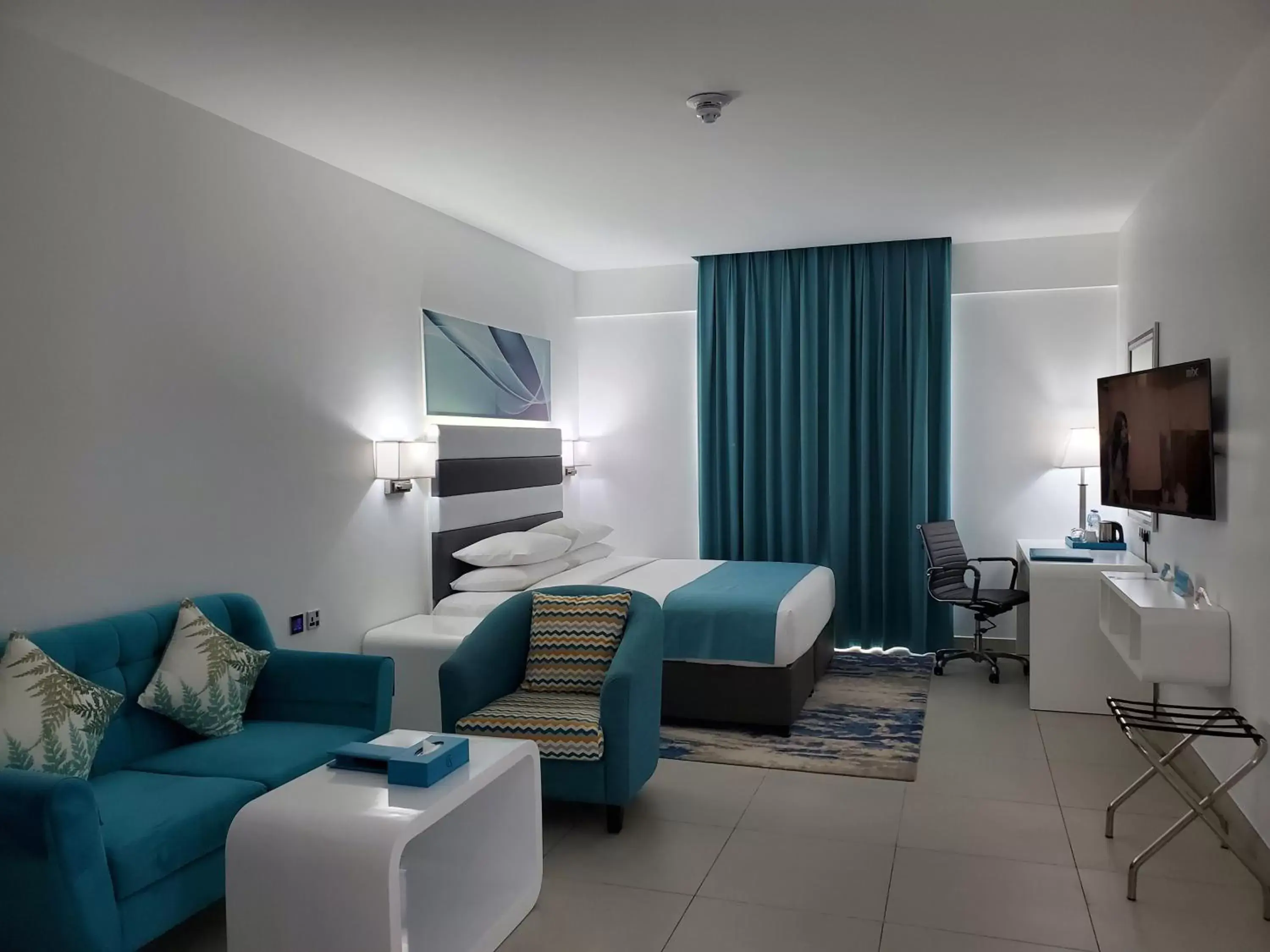 Bedroom in City Avenue Al Reqqa Hotel