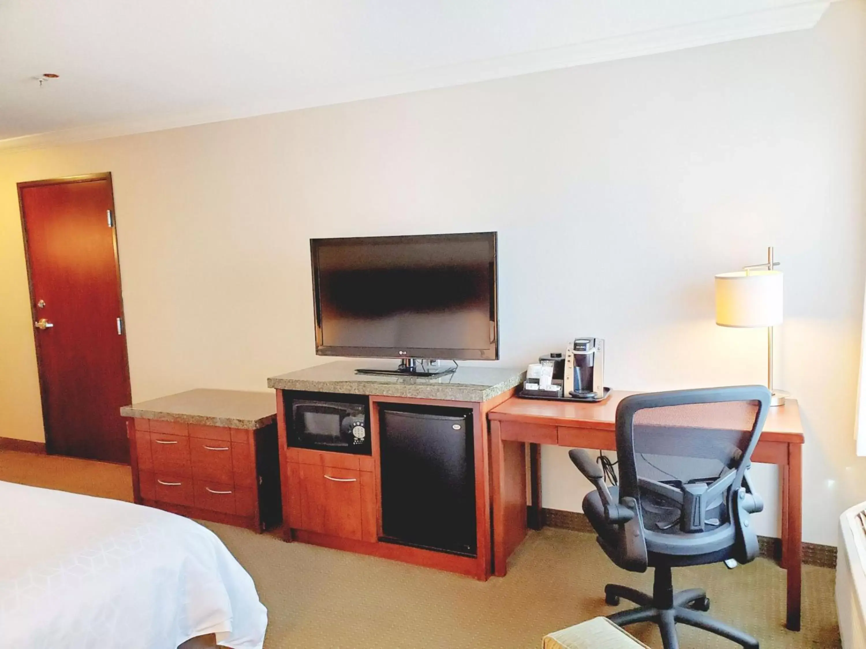 Photo of the whole room, TV/Entertainment Center in Holiday Inn Express Hotel & Suites Portland-Northwest Downtown, an IHG Hotel