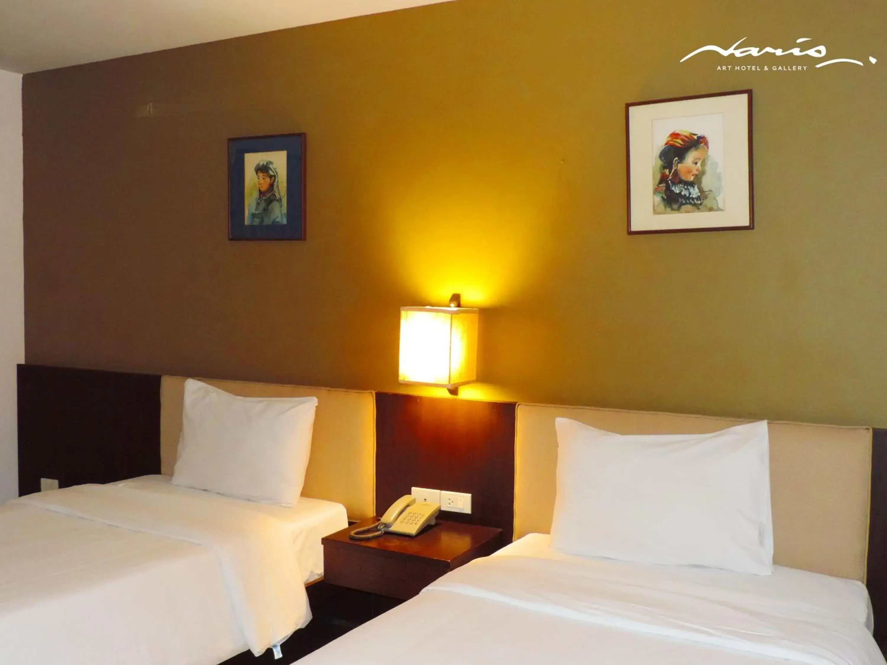 Bed in Naris Art Hotel