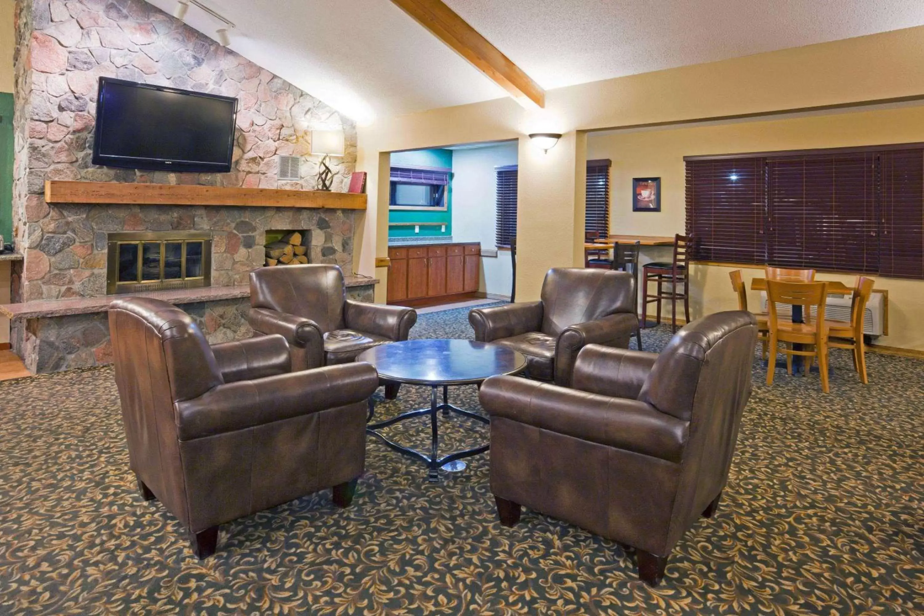Lobby or reception, Seating Area in AmericInn by Wyndham Fargo West Acres