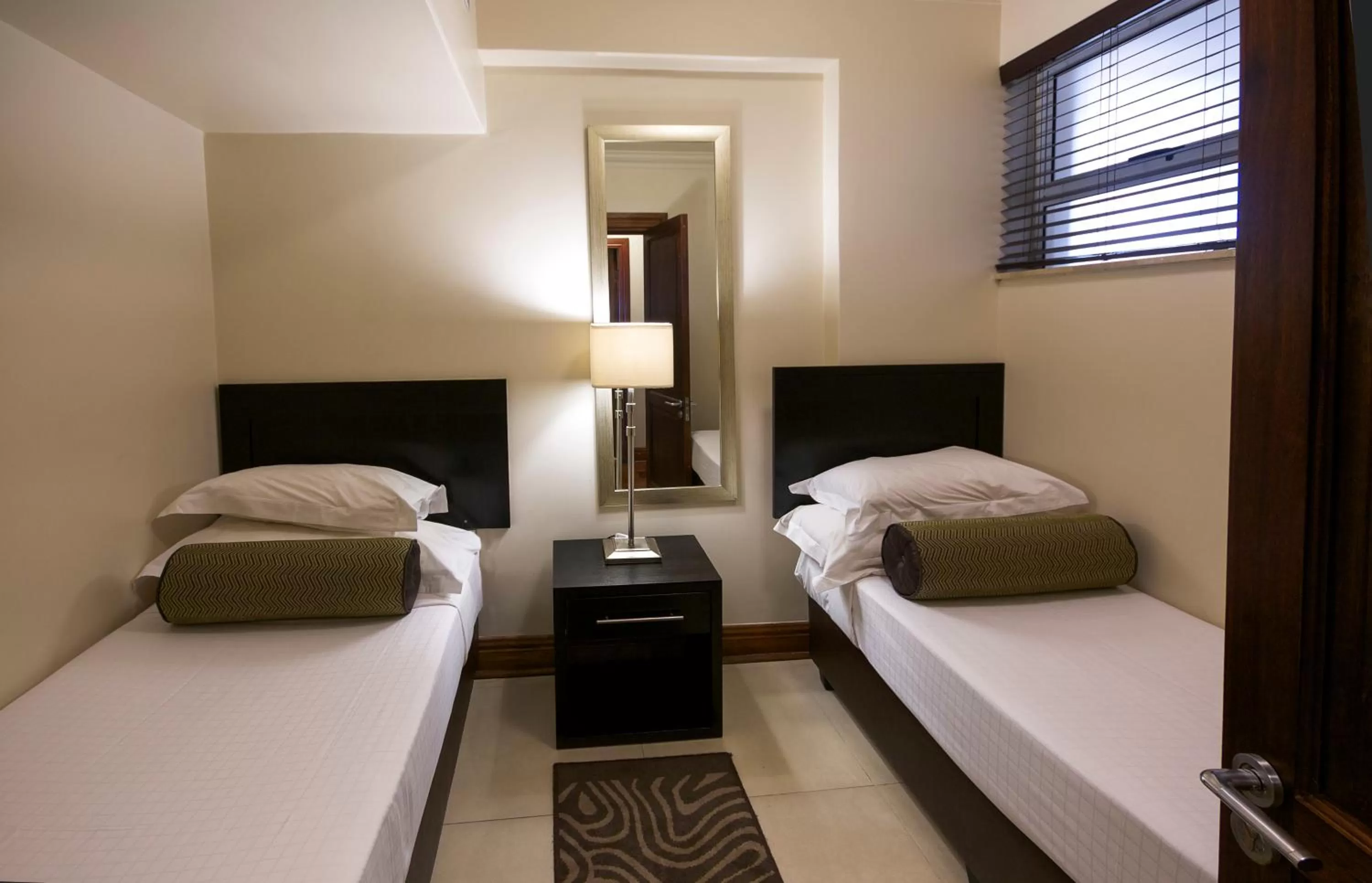 Bedroom, Bed in Belaire Suites Hotel