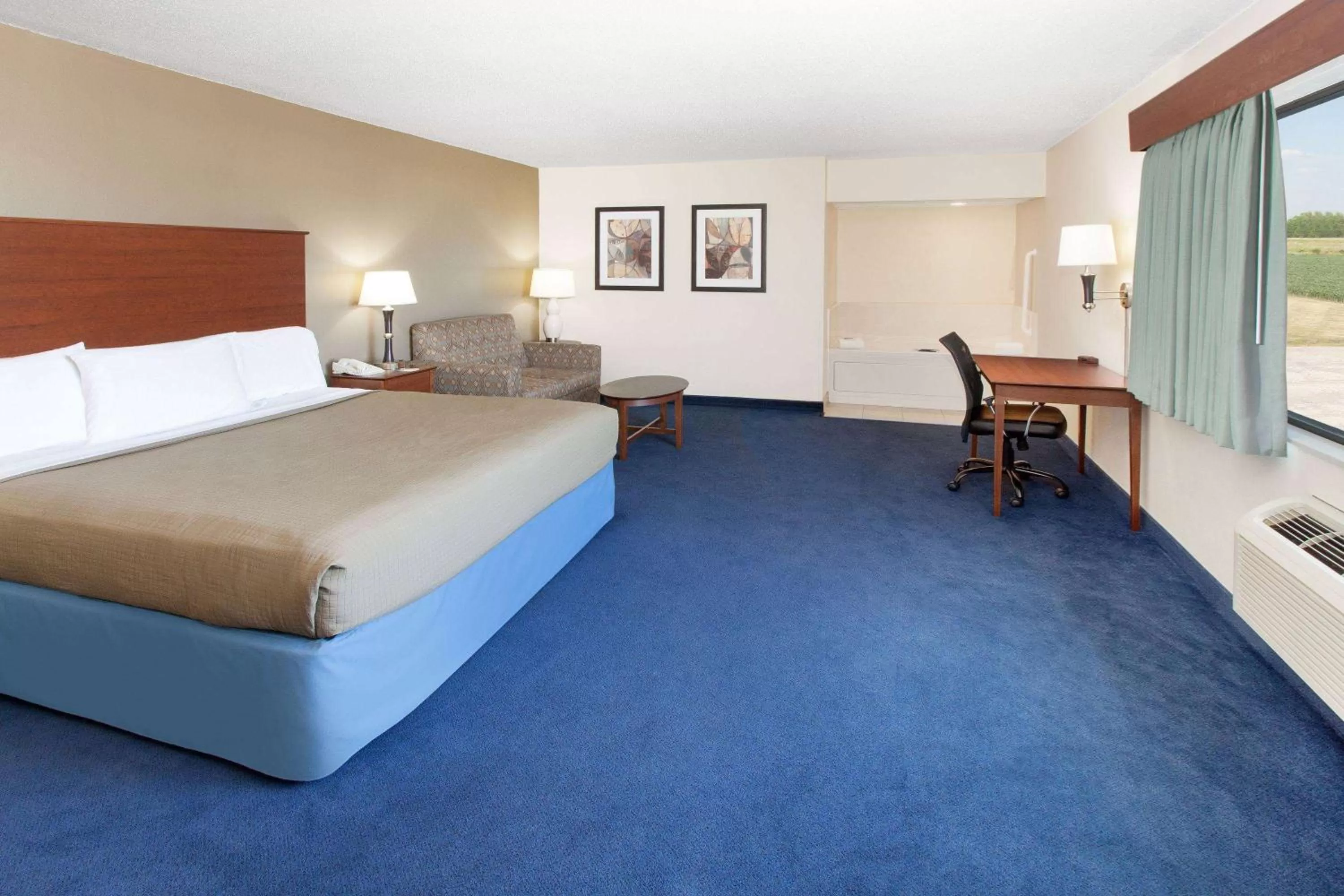 Photo of the whole room, Bed in AmericInn by Wyndham Webster City