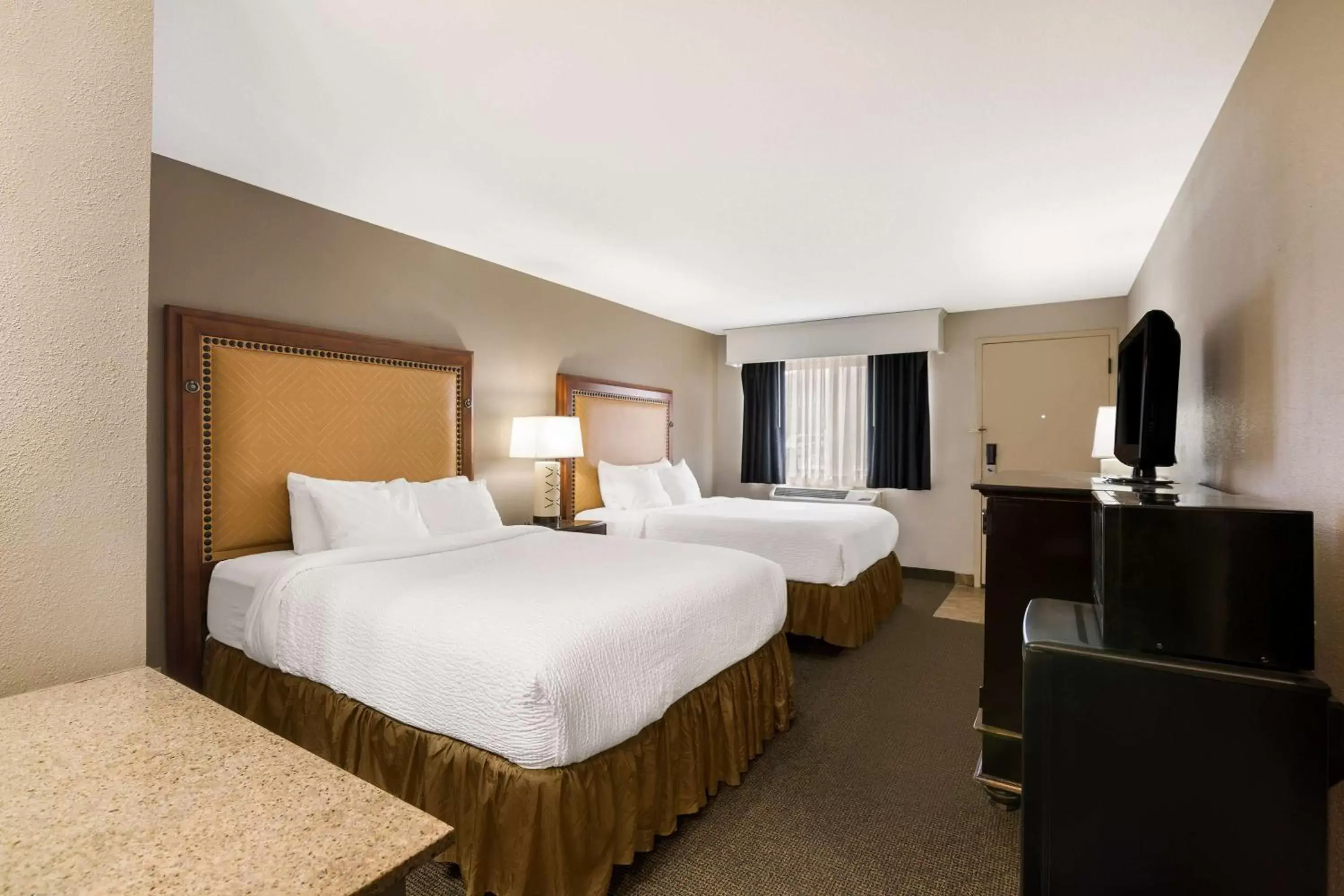 Bedroom, Bed in Revel Hotel Minot - SureStay Collection by Best Western