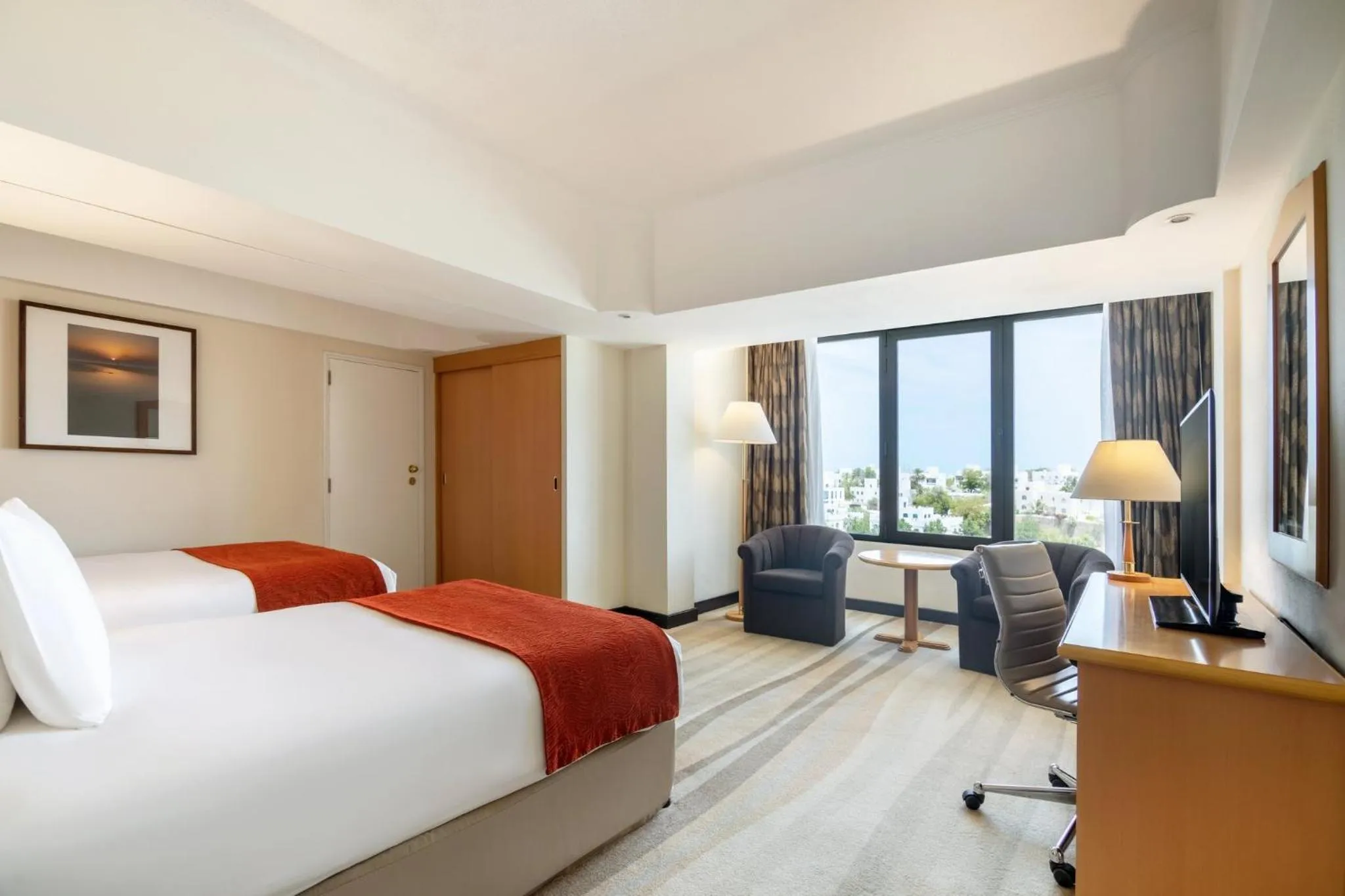 Photo of the whole room, Bed in Crowne Plaza Muscat by IHG