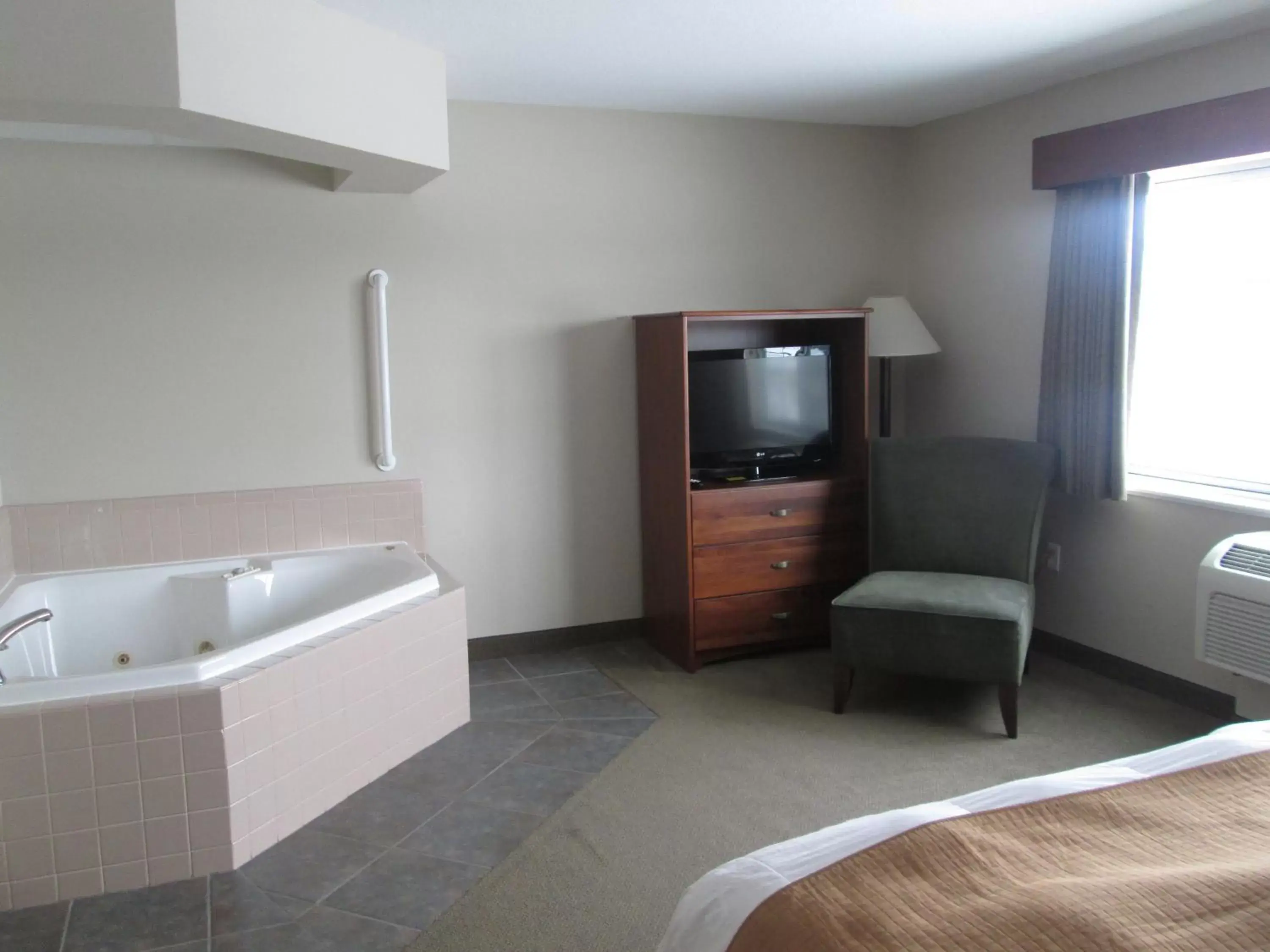 TV/Entertainment Center in AmericInn by Wyndham Charlevoix