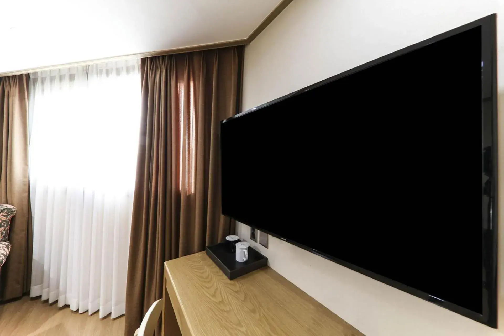 TV and multimedia, TV/Entertainment Center in Nohyung Hotel