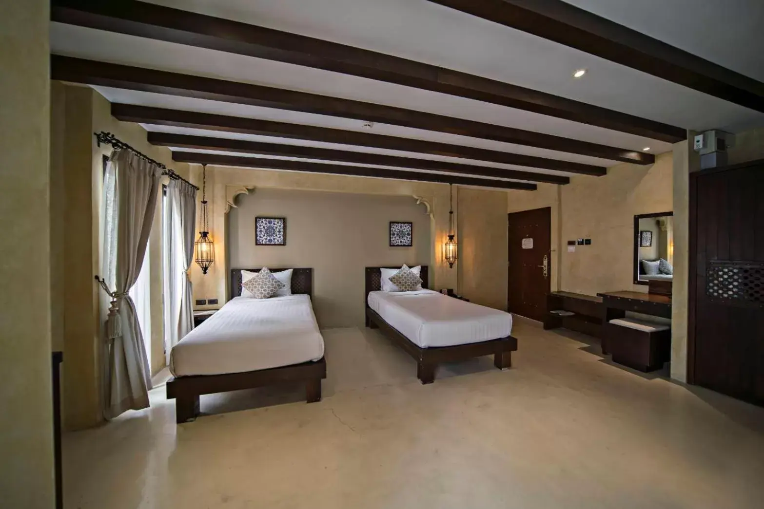 Photo of the whole room, Bed in Dewan Bangkok - SHA Certified
