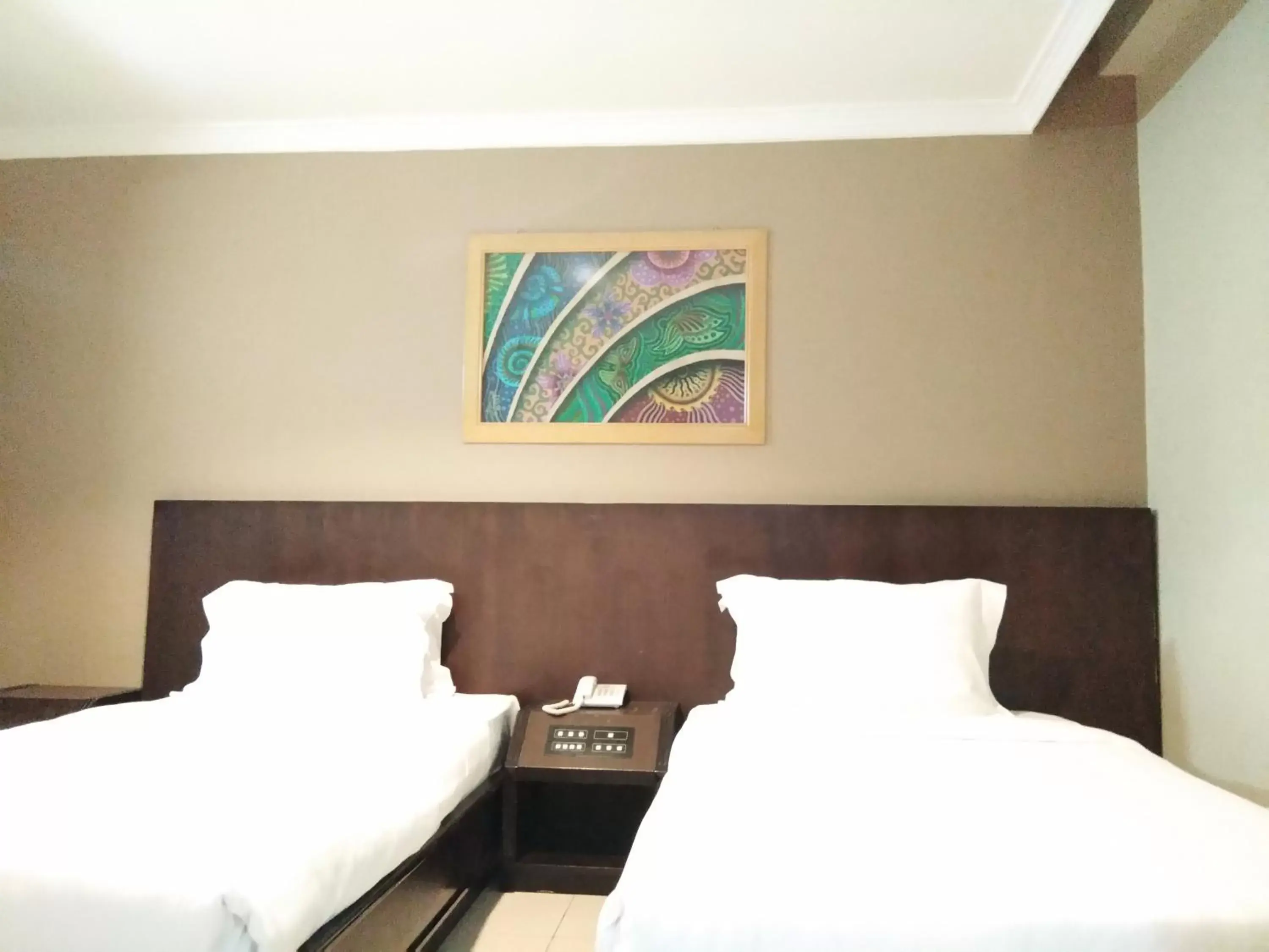 Bed in Kinabalu Daya Hotel