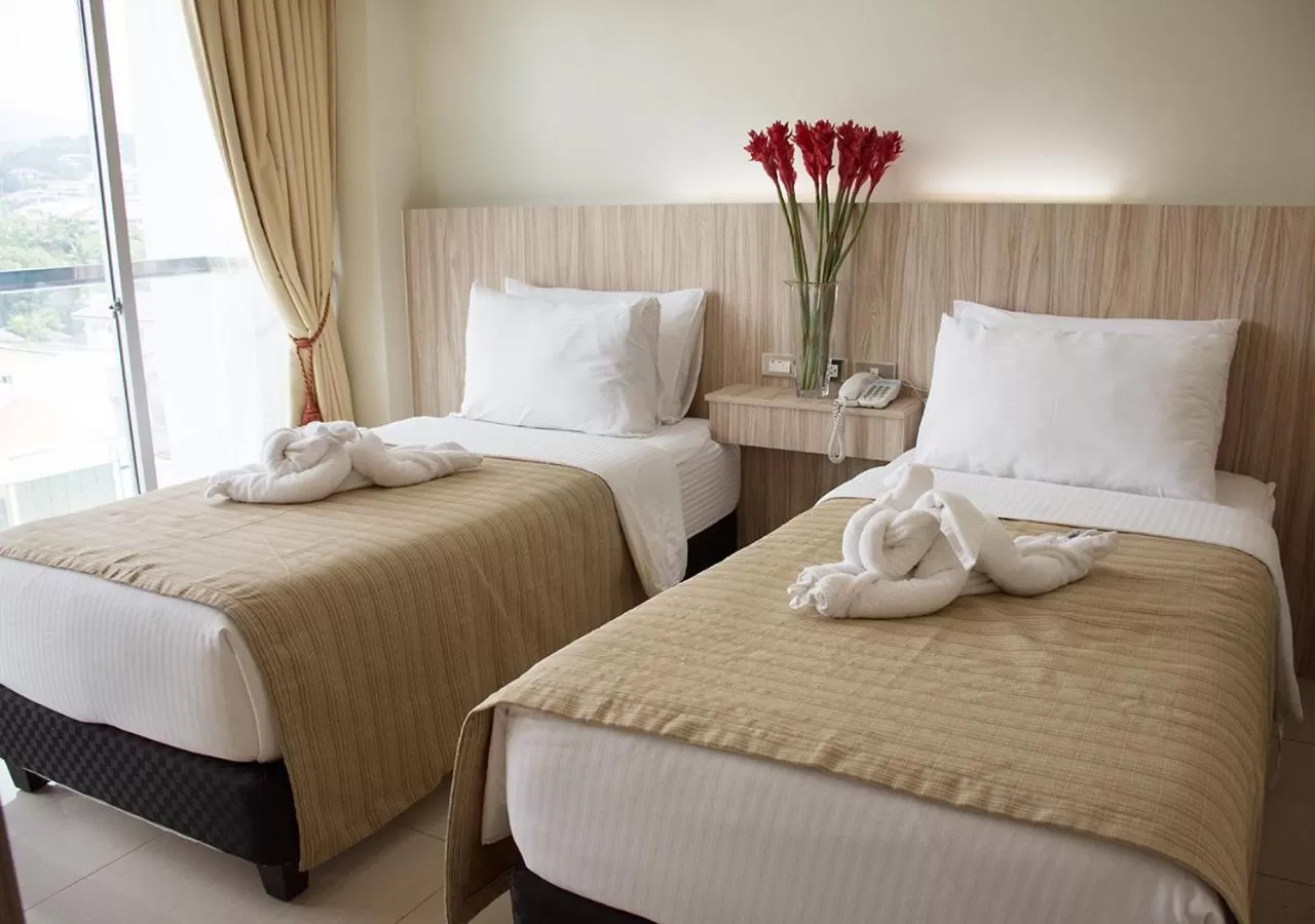 Bed in Alicia Apartelle