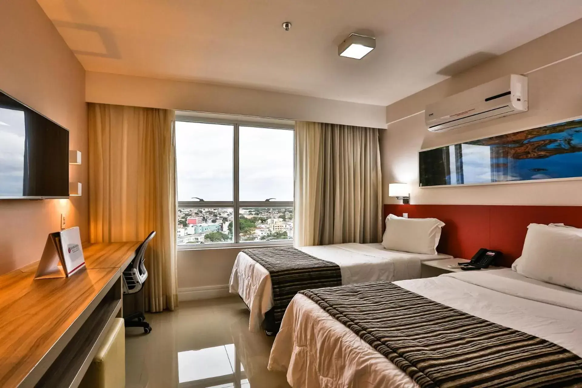 Photo of the whole room in Ramada Hotel & Suites Campos Pelinca