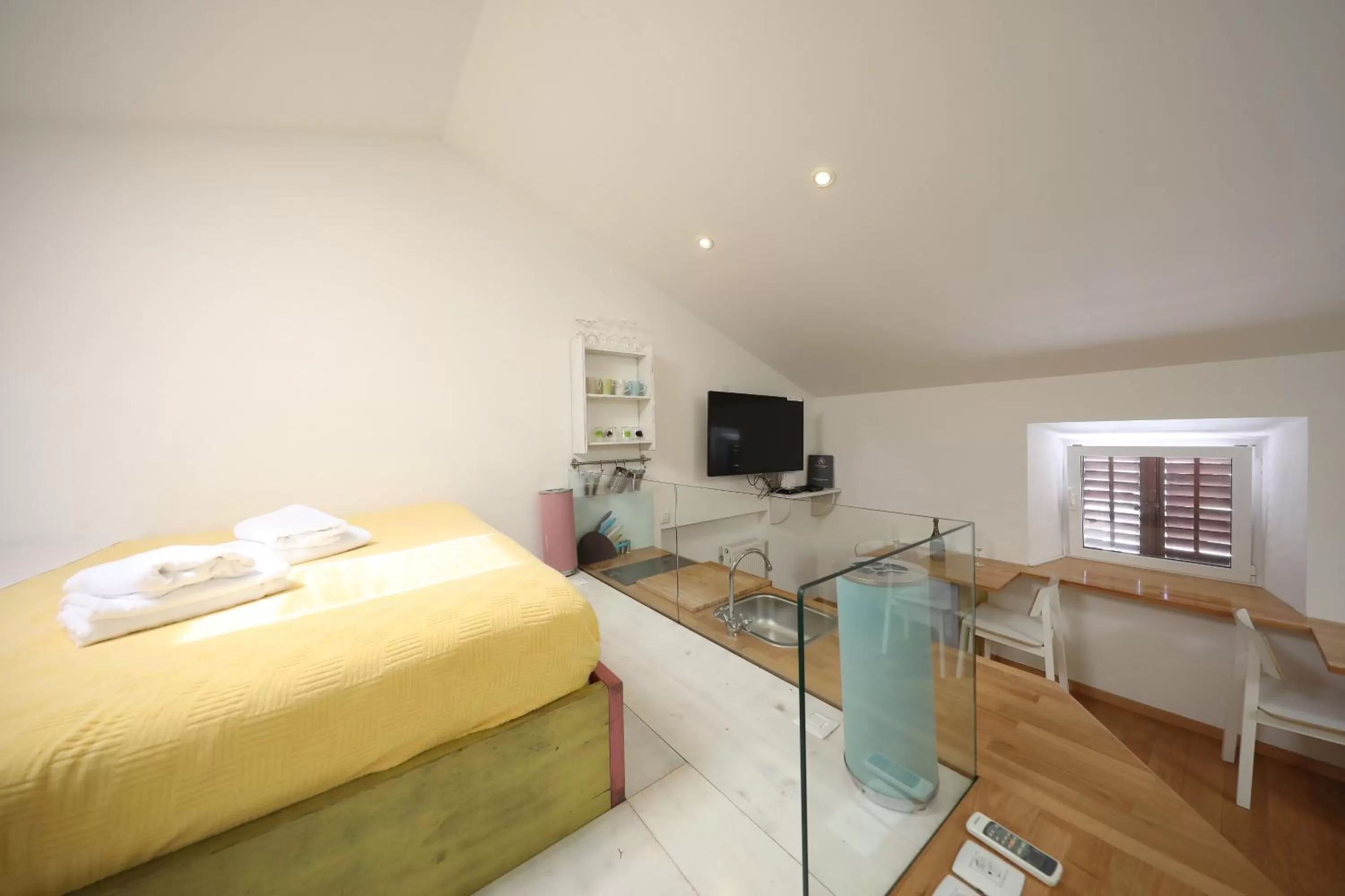 Bed in Central Apartments Integrated Hotel