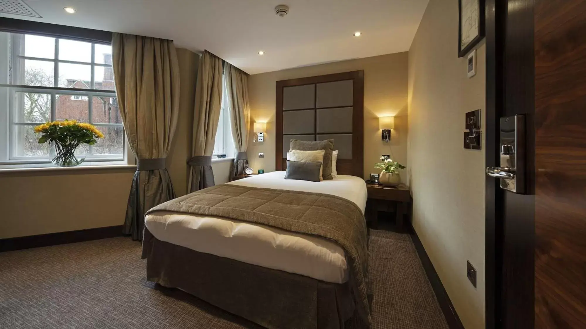 Bed in Wellington Hotel by Blue Orchid