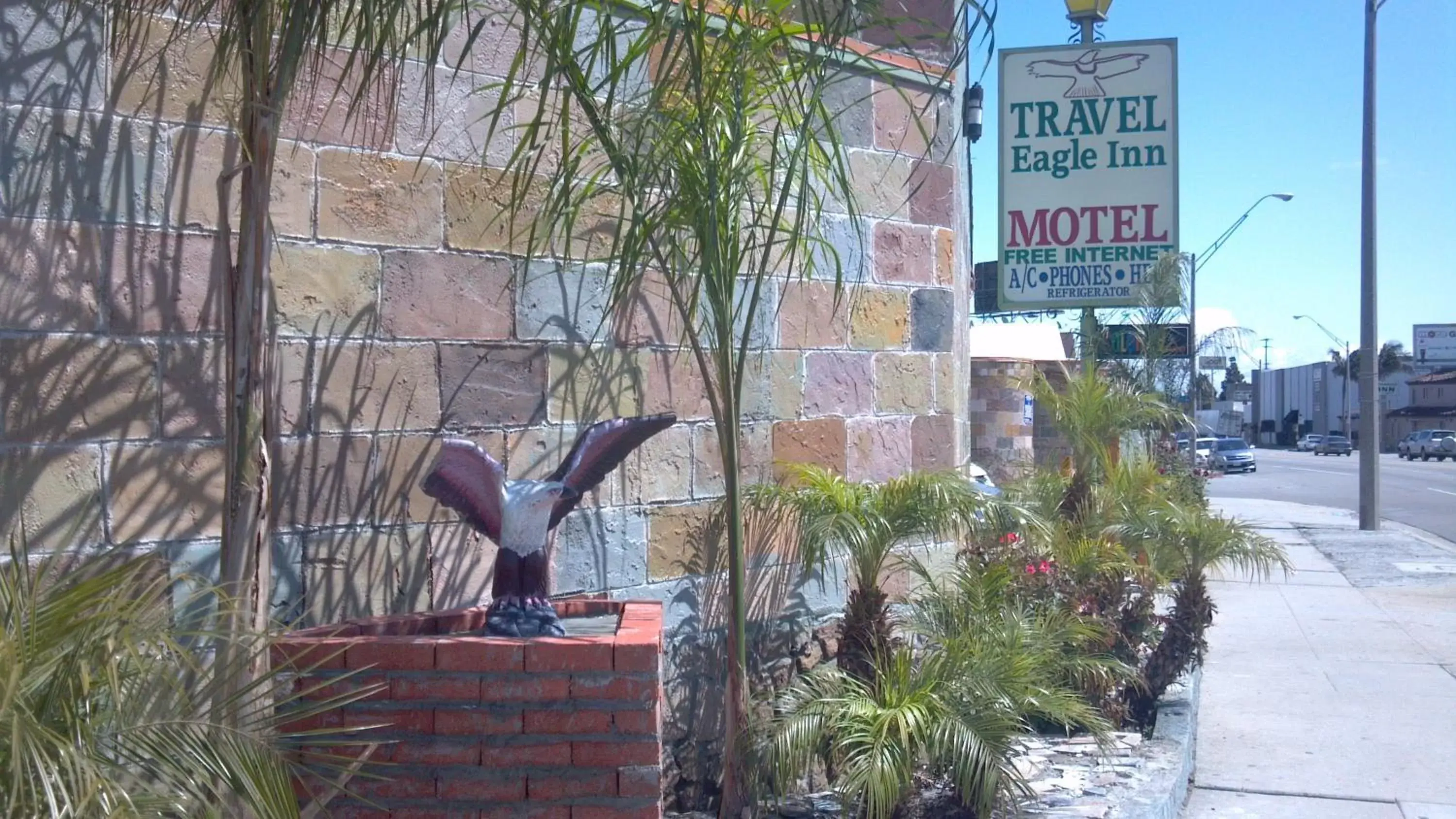 Property logo or sign, Property Building in Travel Eagle Inn Motel