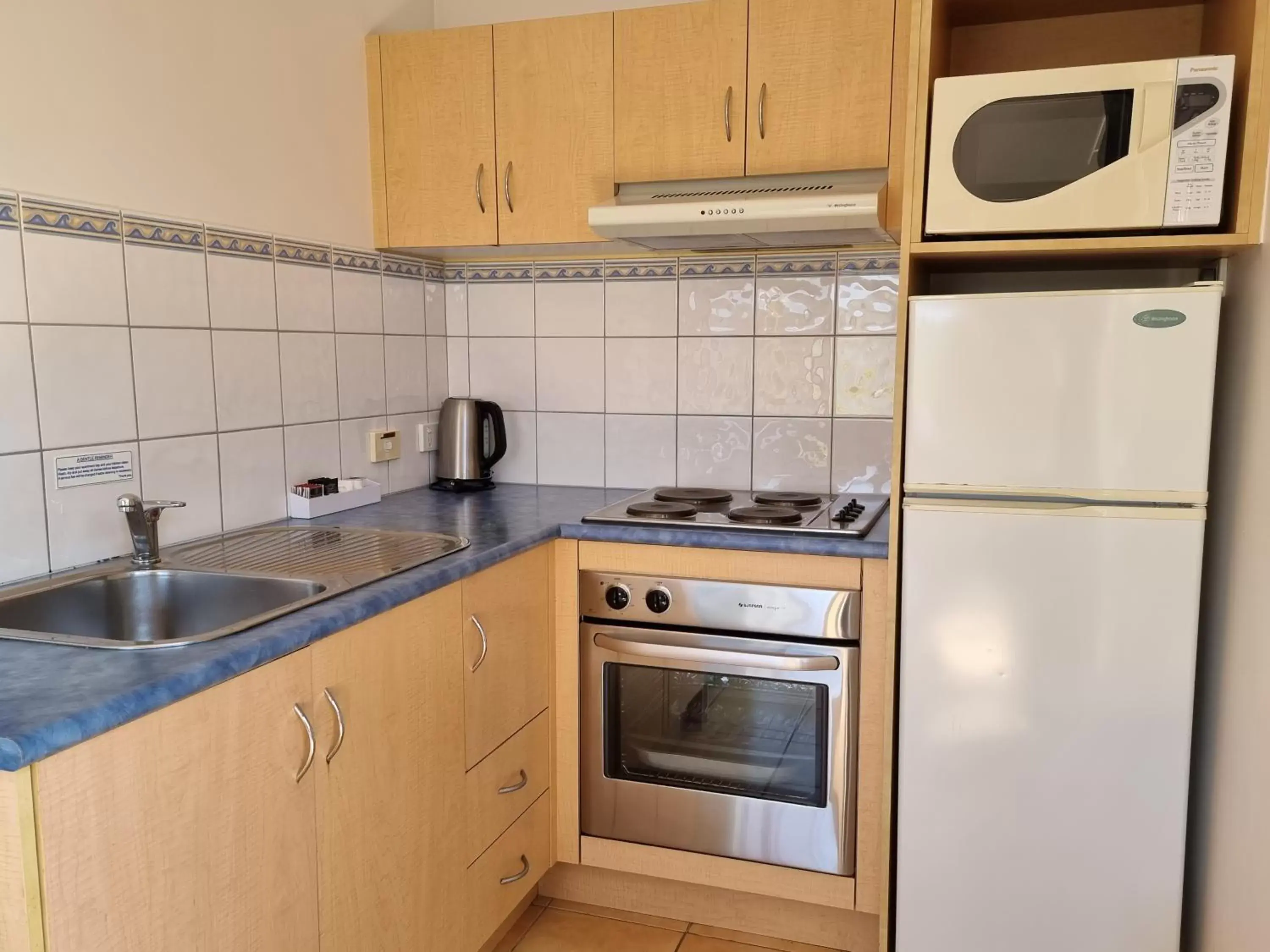 Kitchen or kitchenette, Kitchen/Kitchenette in Seaview Motel & Apartments