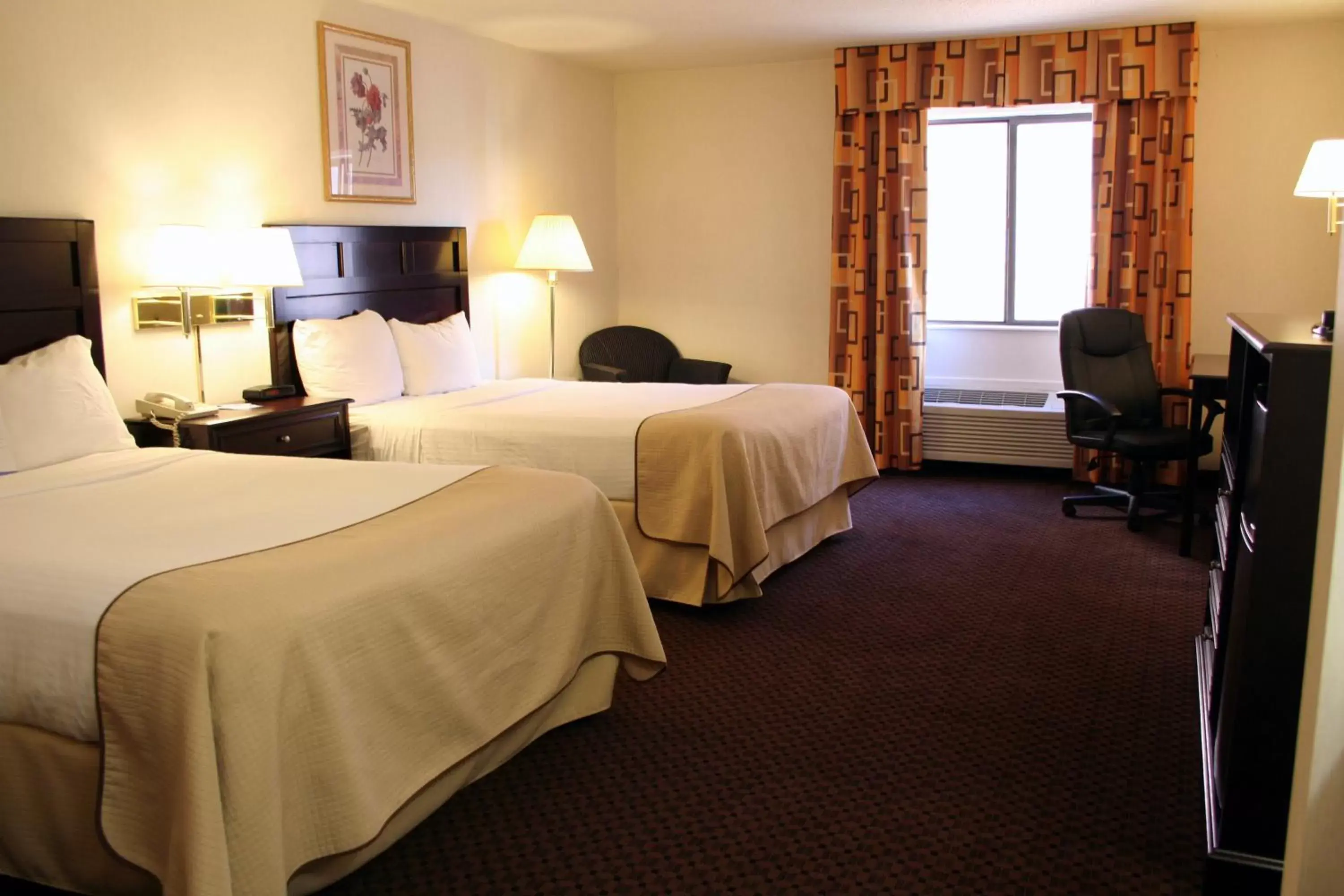 Bed in Baymont by Wyndham Battle Creek Downtown