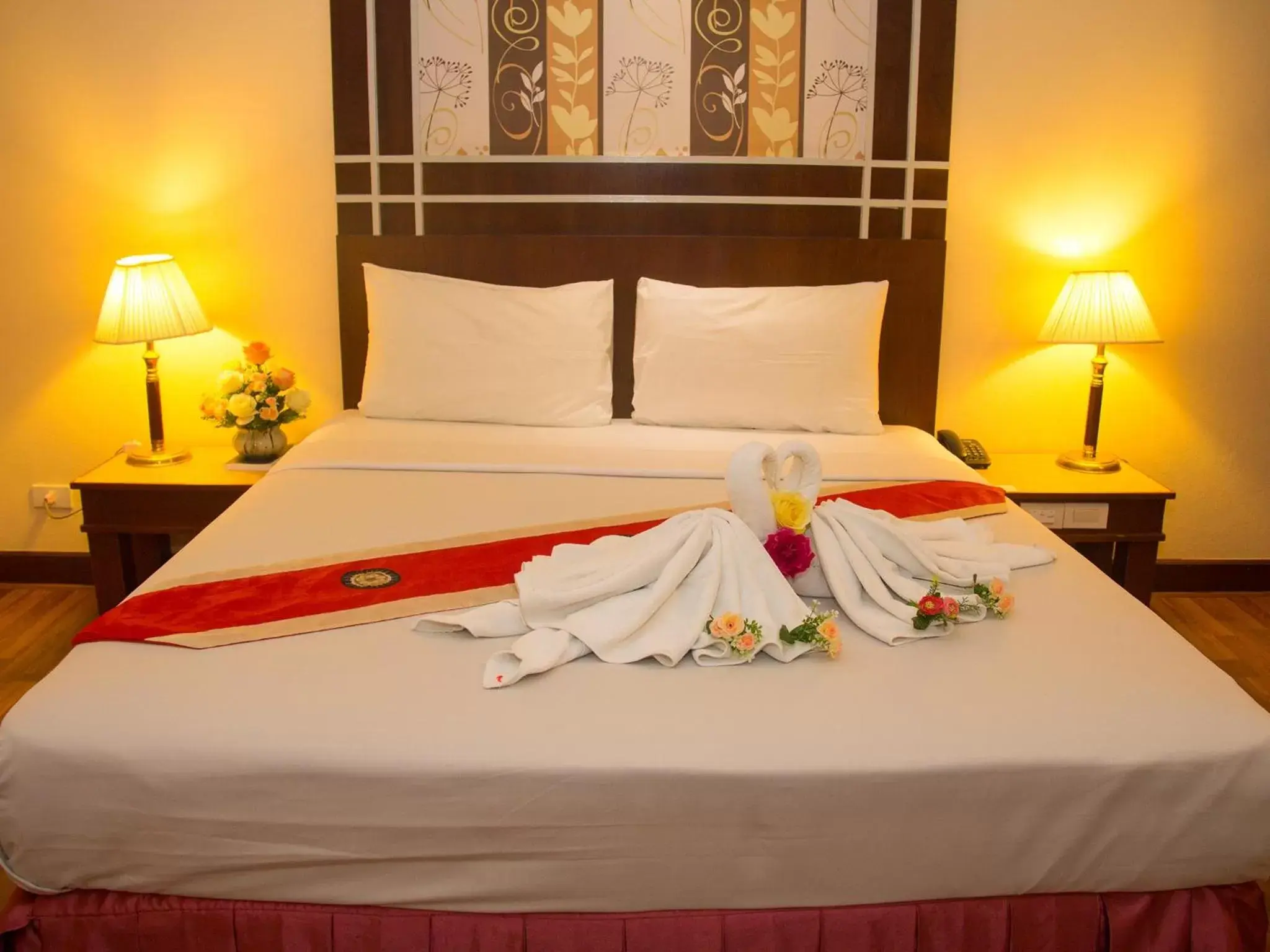 Bed in Friendlytel Hotel