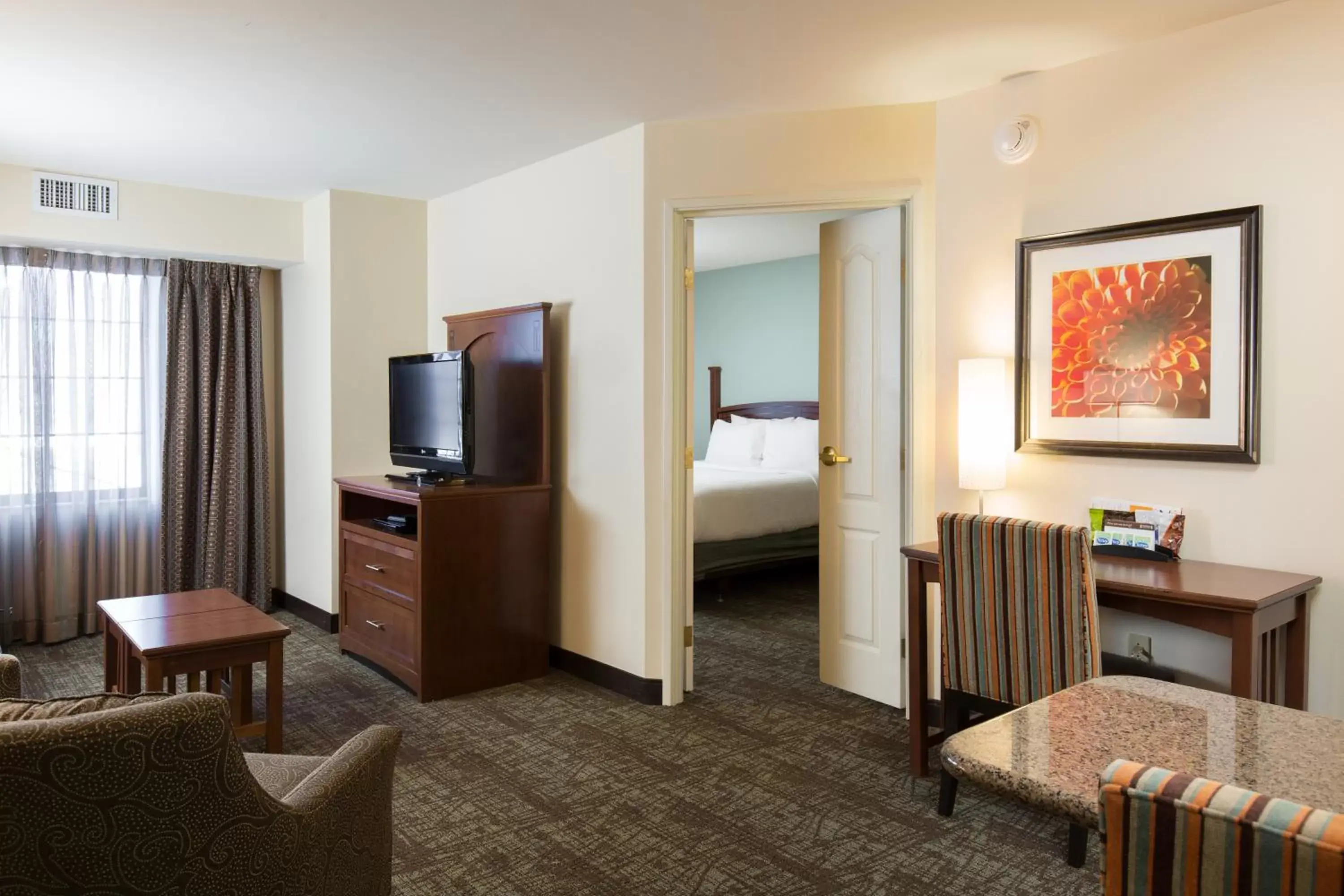 Photo of the whole room, TV/Entertainment Center in Staybridge Suites - Columbus Polaris, an IHG Hotel