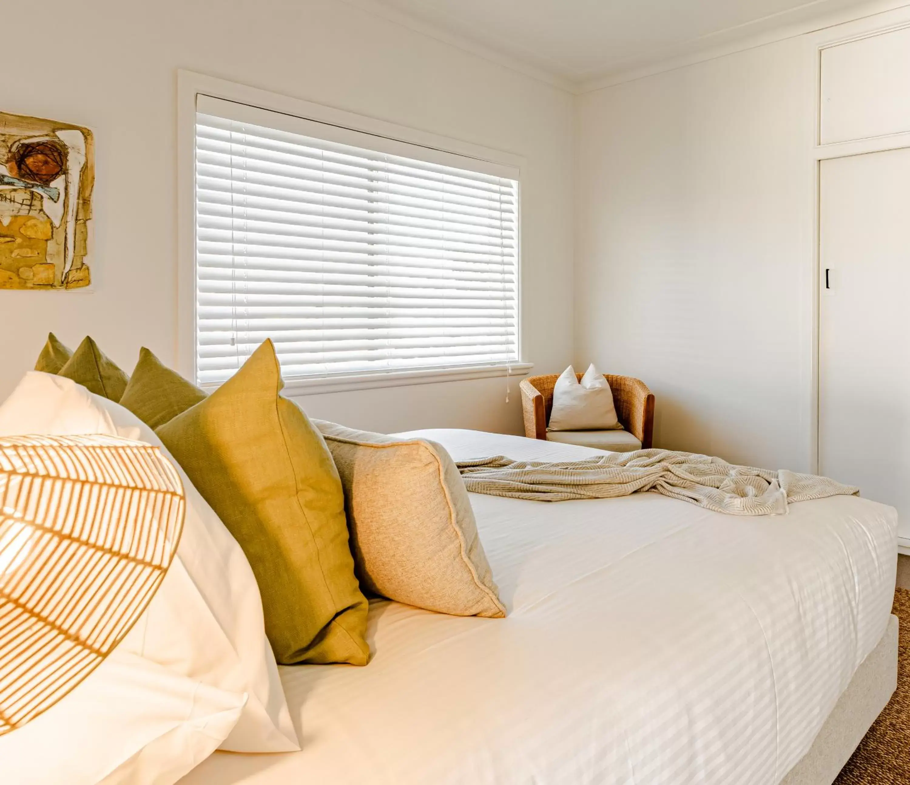 Bed in Bay Breeze Boutique Accommodation