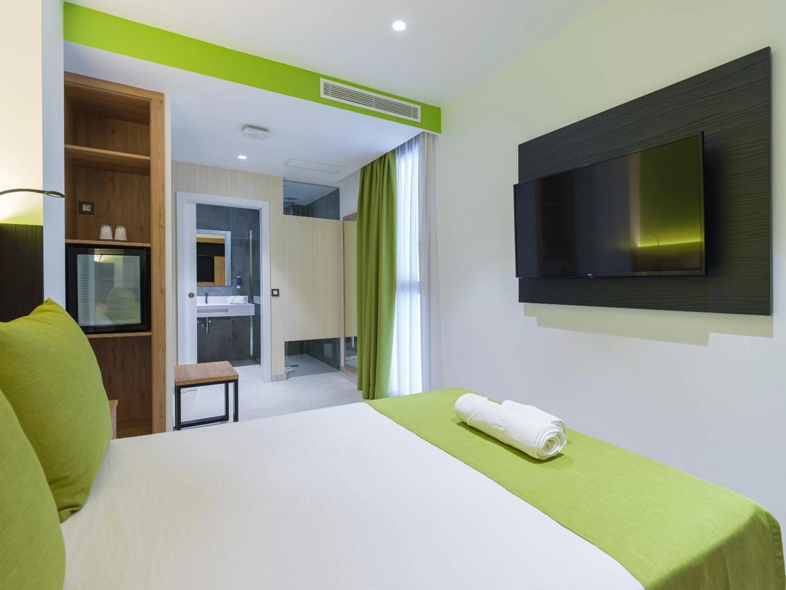 Bed in Hotel MG Poniente