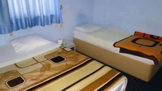 Bed in Sunrise Hotel