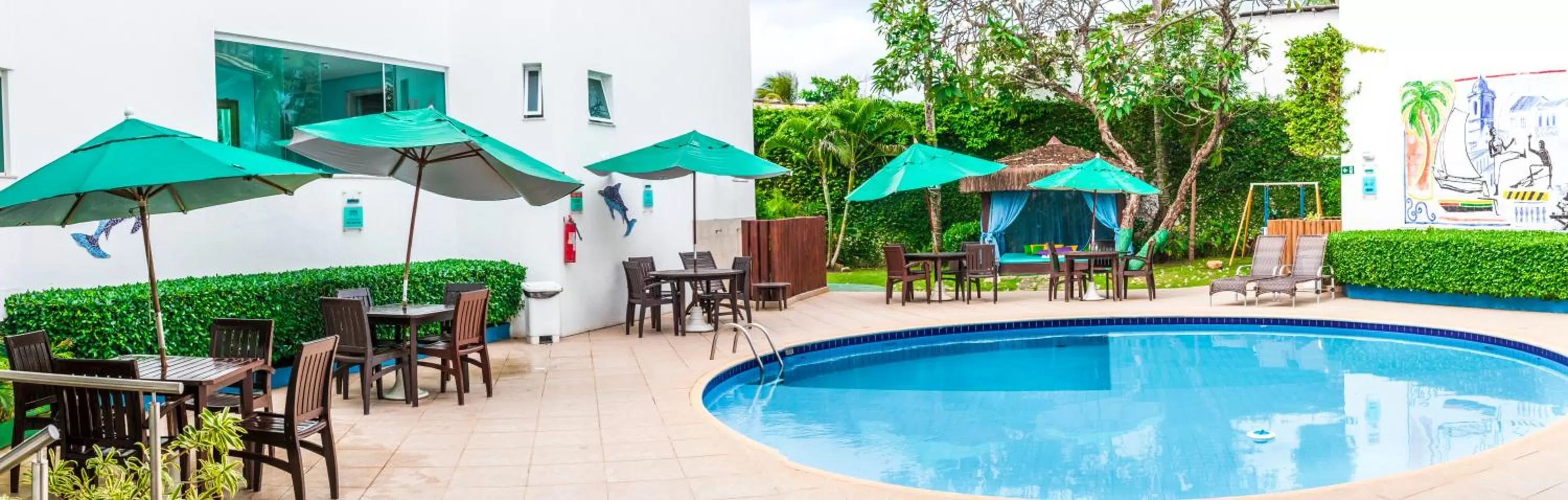 Property building in Farol de Itapuã Praia Hotel