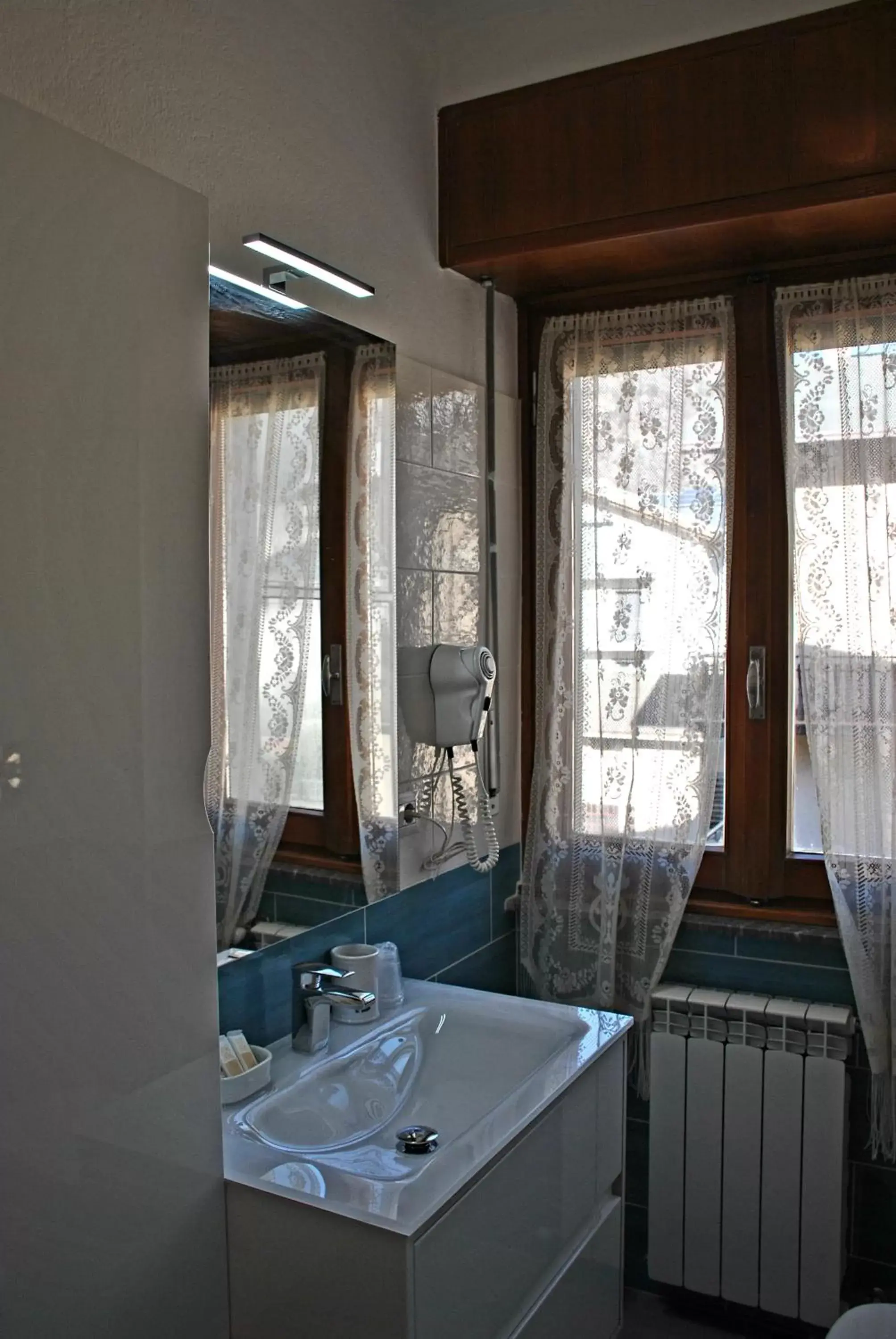 Bathroom in Albergo Motel Dosdè