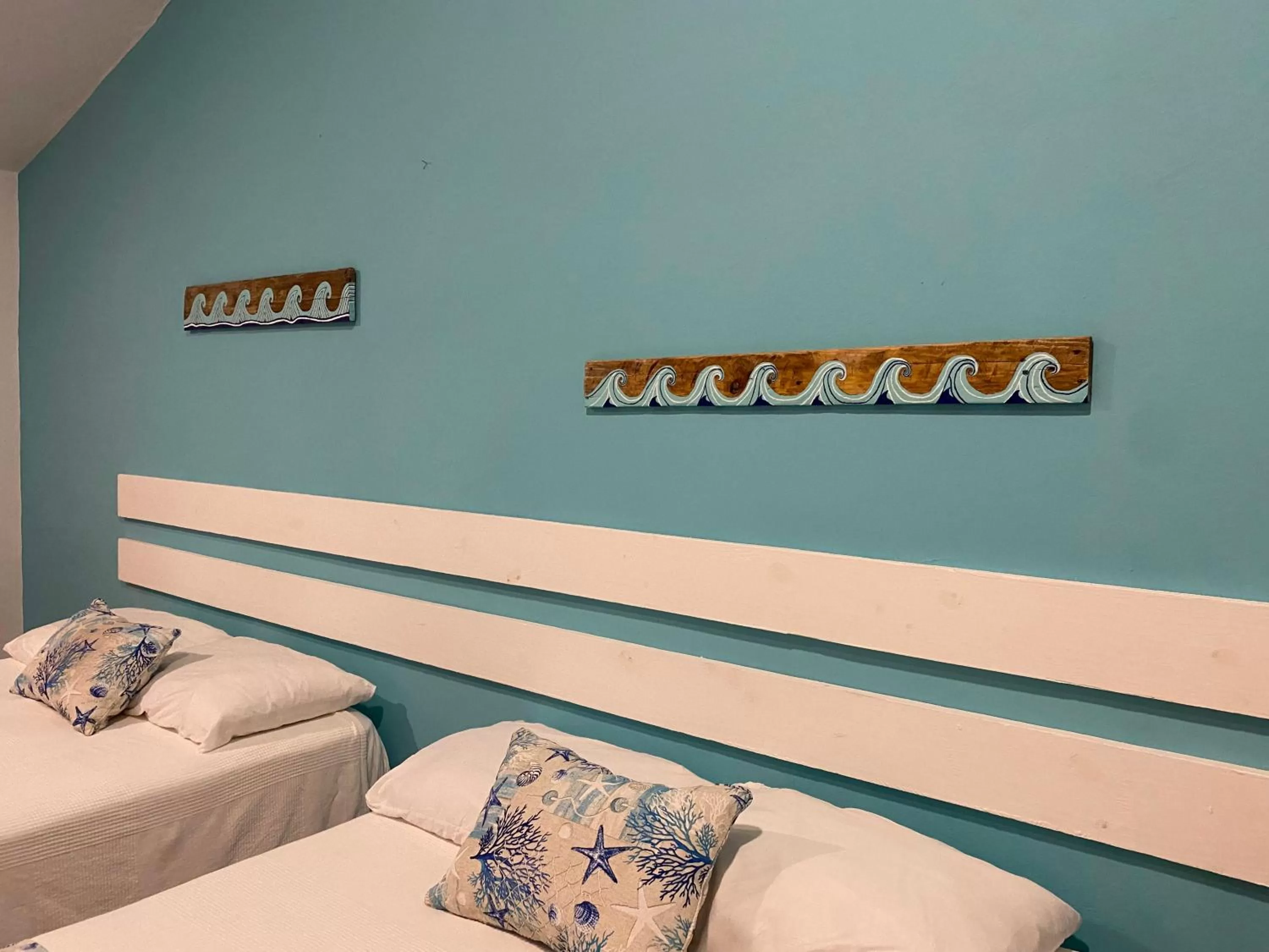 Bed in Calypso Beach Hotel