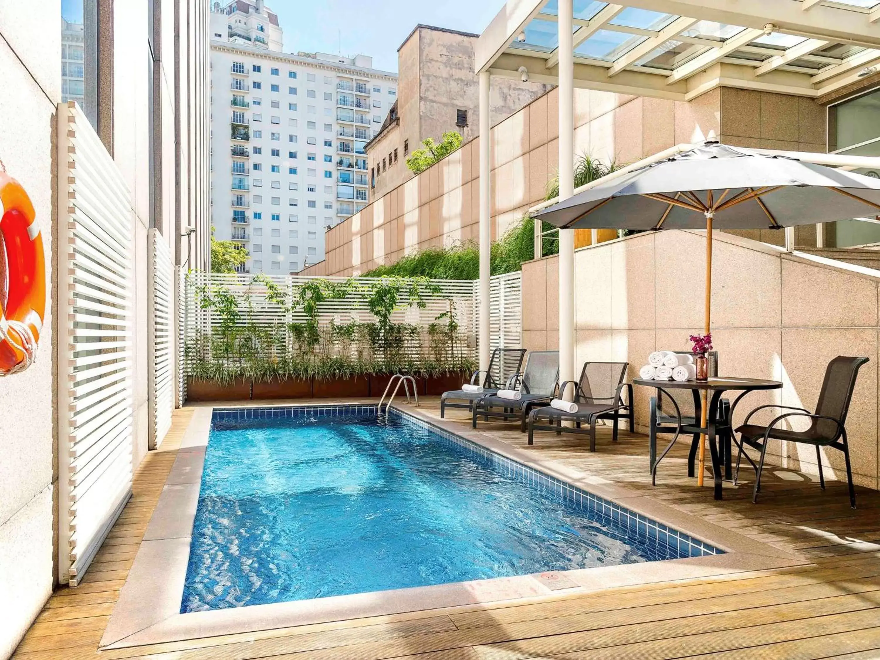 Property building, Swimming Pool in Pullman Sao Paulo Ibirapuera