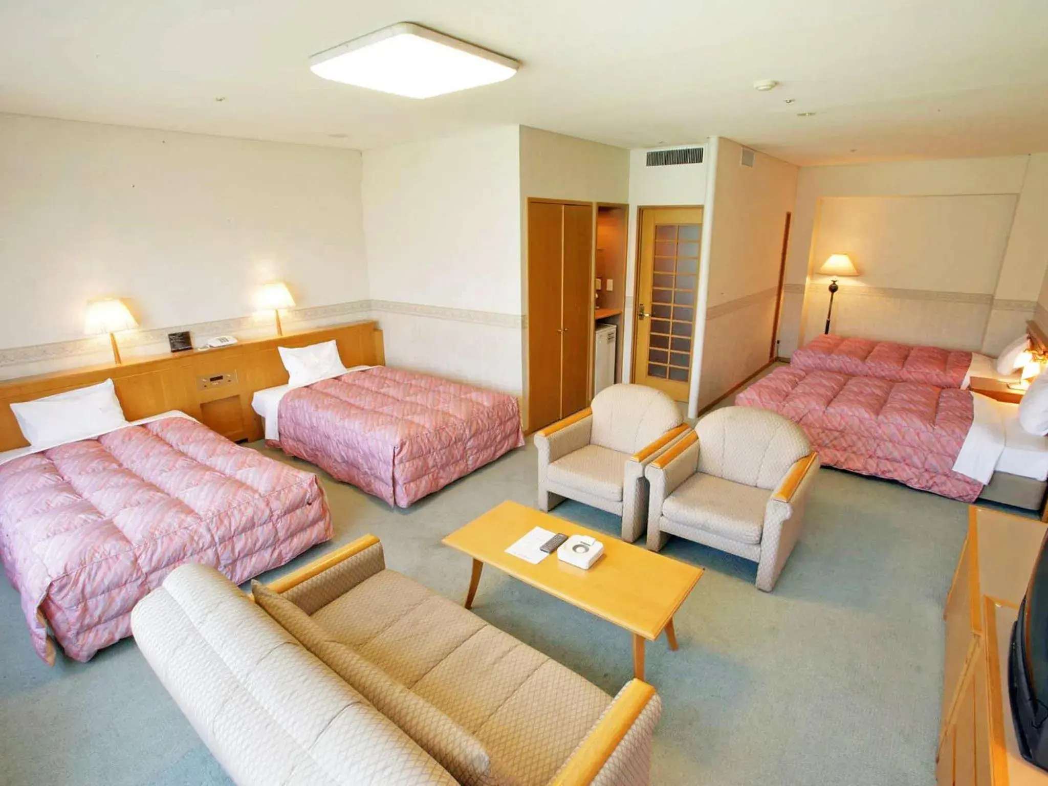 Living room, Bed in Tsumagoi Resort Sai no Sato