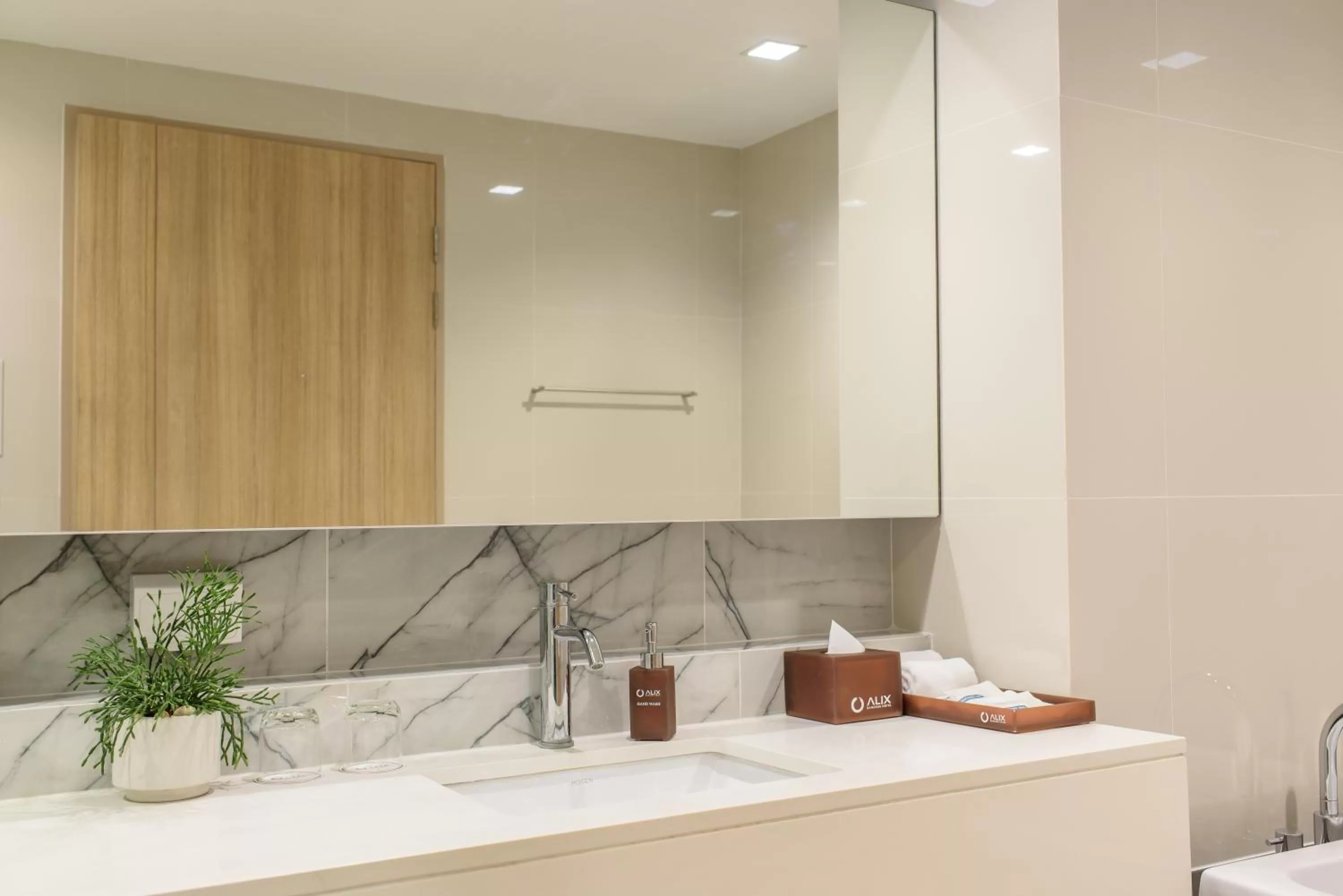 Bathroom in Alix Bangkok Hotel