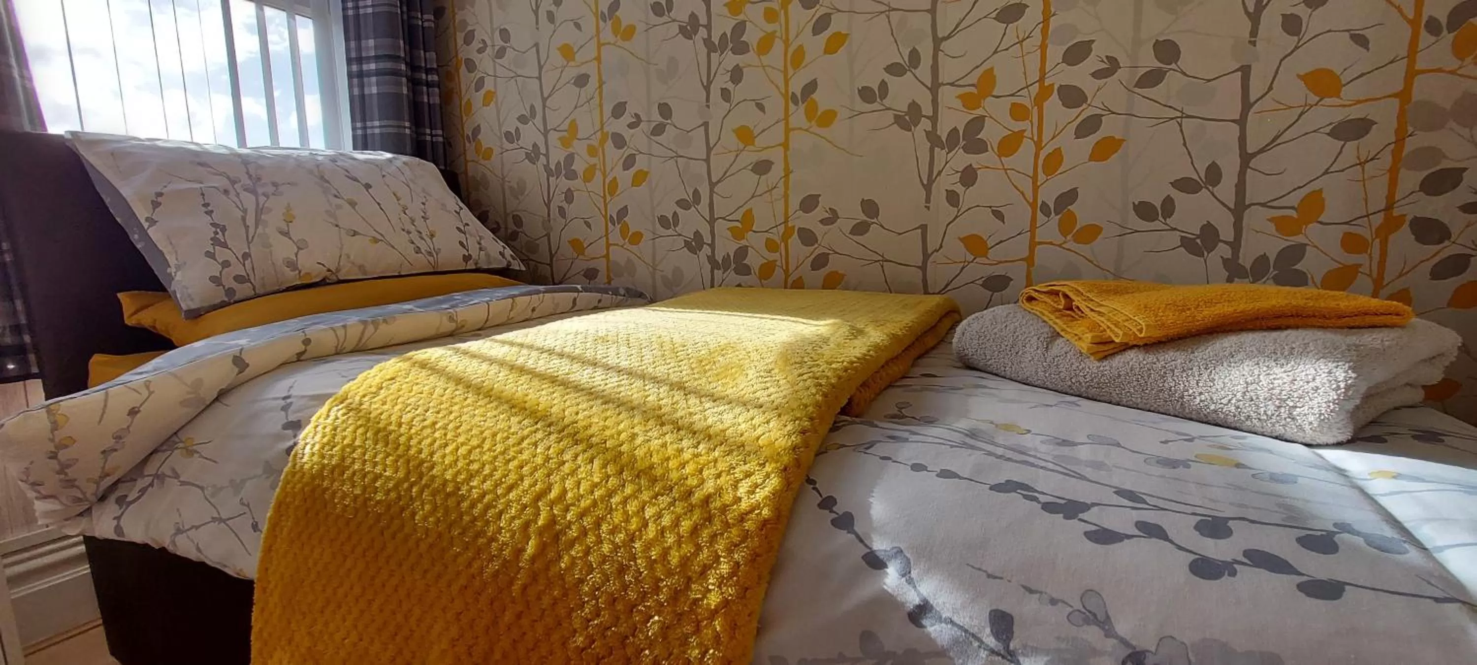 Bed in Daffodil Guest House