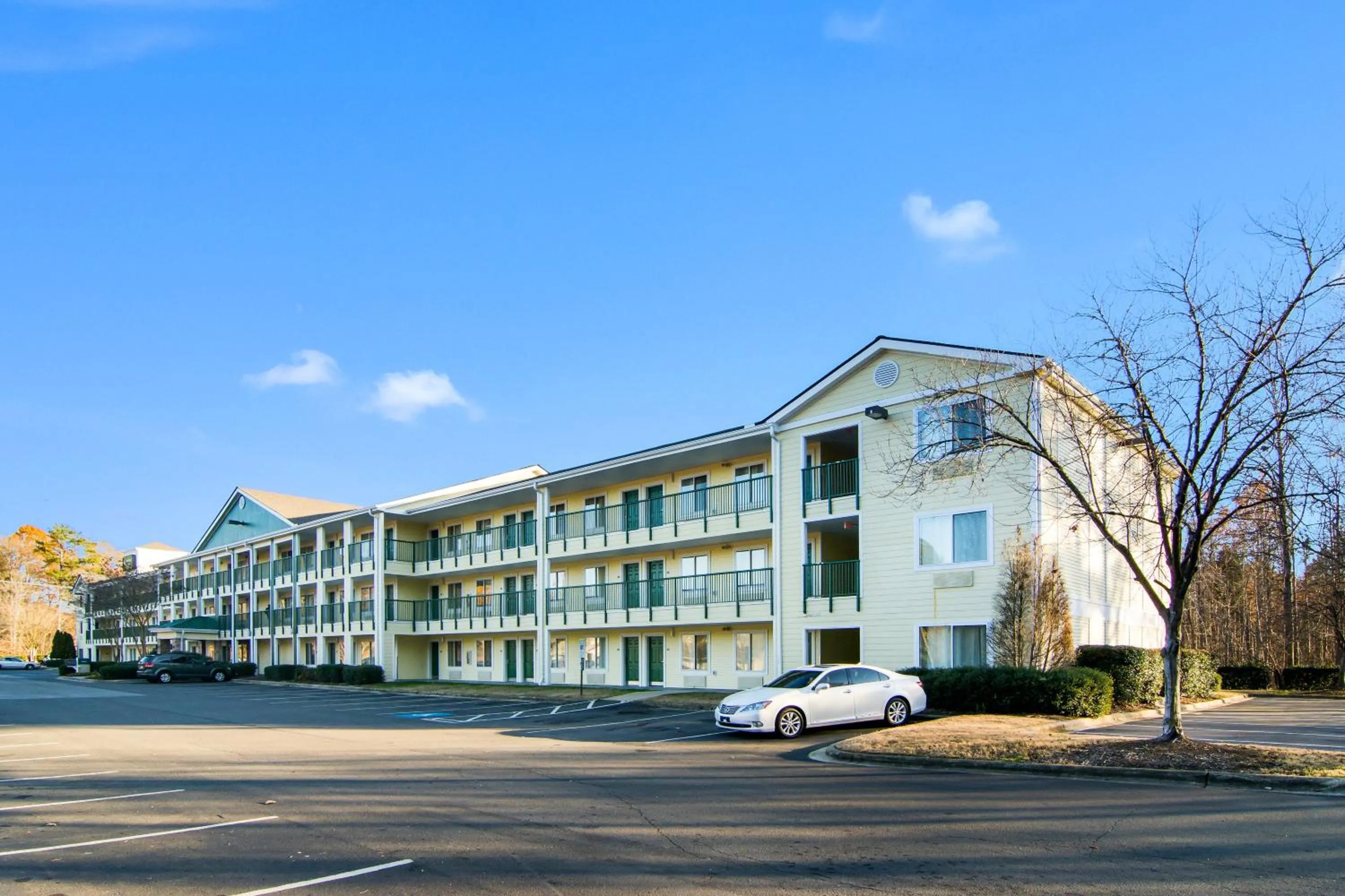 Property building in HomeTowne Studios by Red Roof Raleigh – Durham