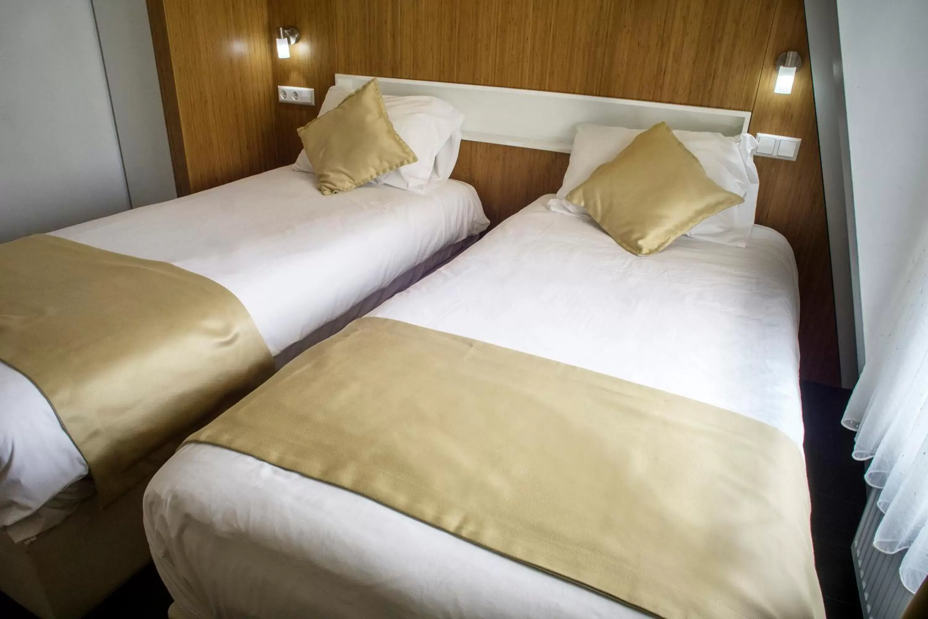 Bed, Room Photo in Hotel Larende