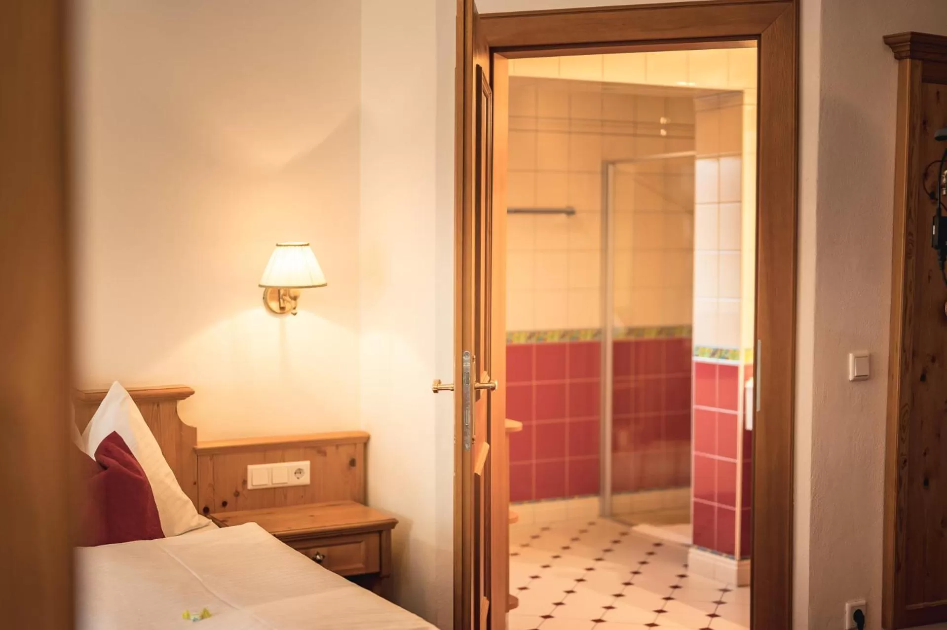 Bathroom, Bed in Hotel Schartner