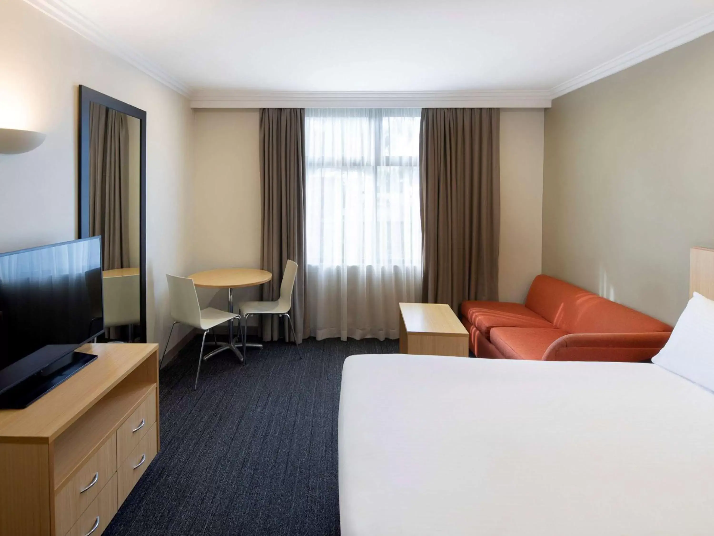 Bedroom, Seating Area in Mercure Sydney Blacktown