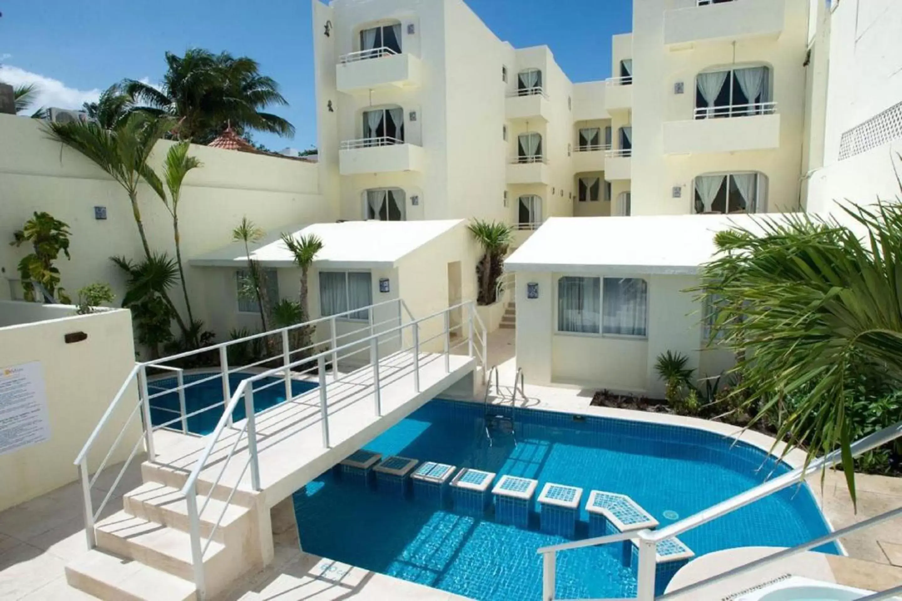 Swimming Pool in Playa Maya by MIJ - Beachfront Hotel