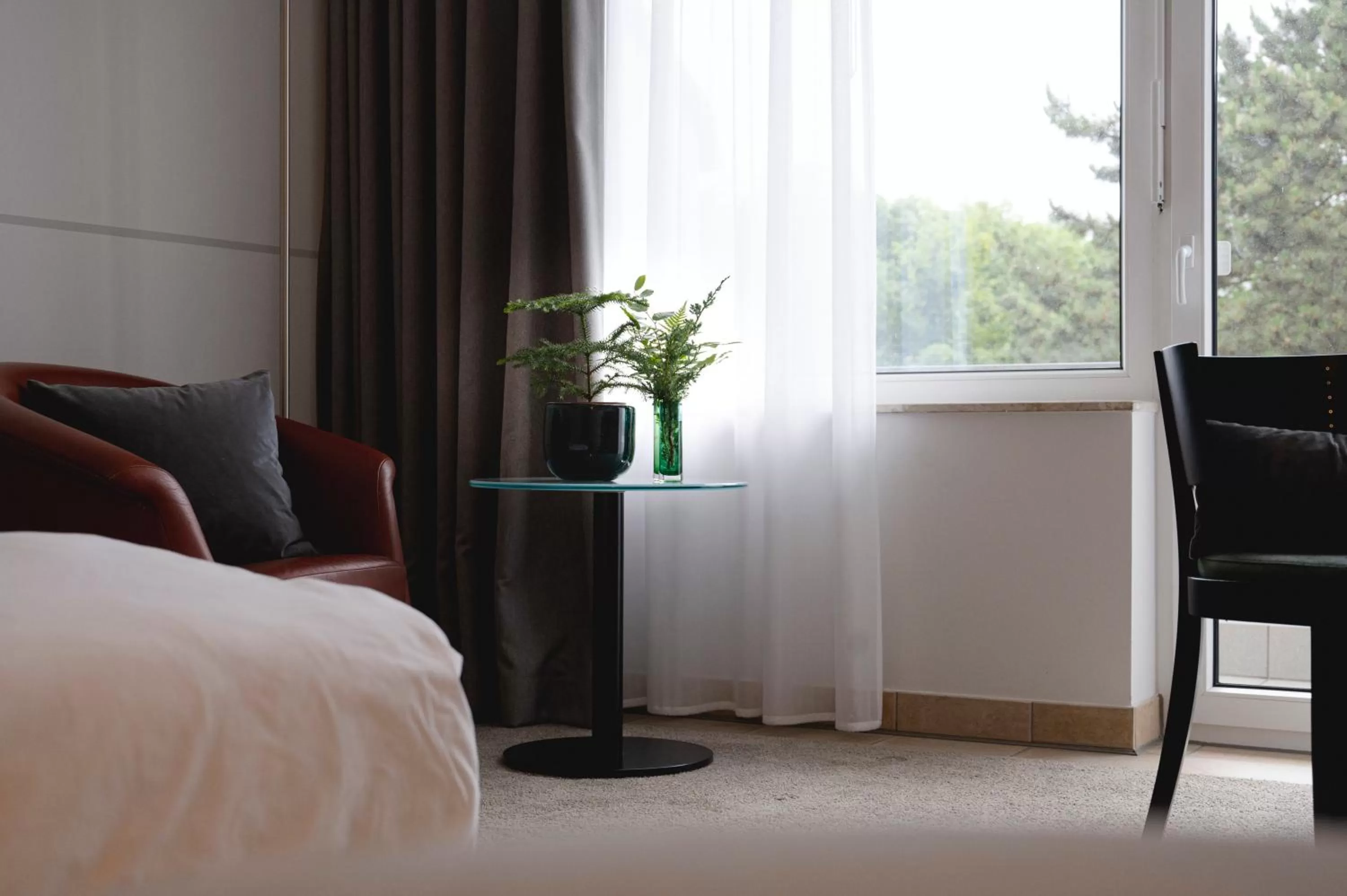 Photo of the whole room, Bed in Hotel VierJahreszeiten am Seilersee