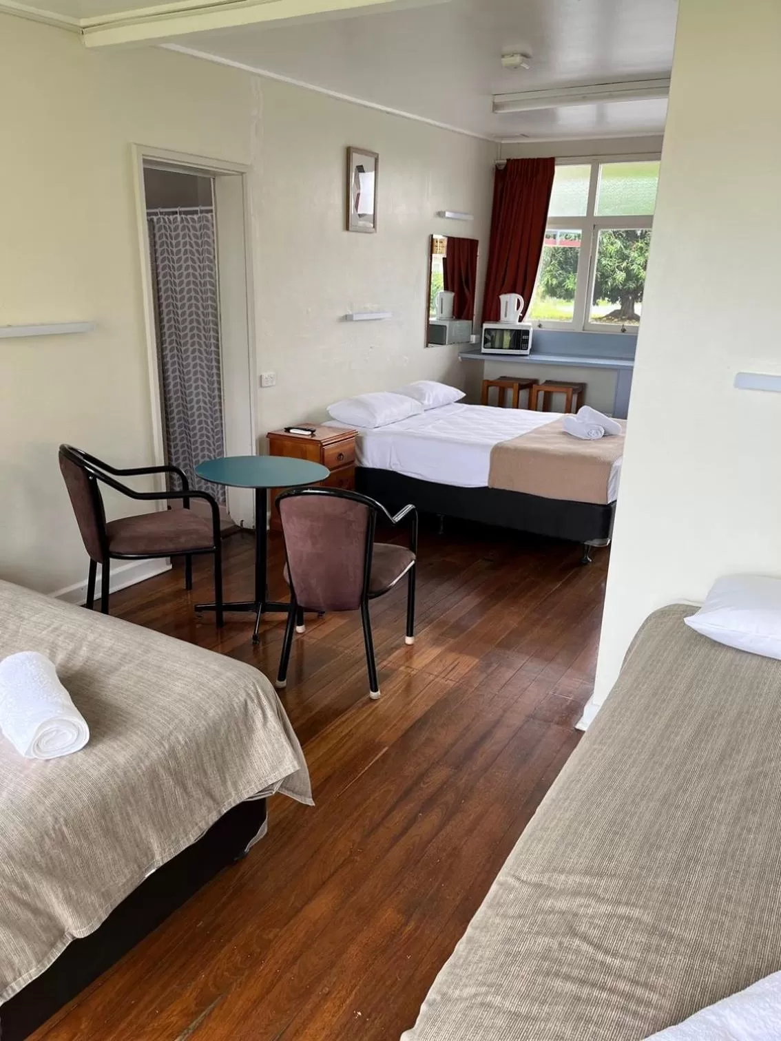 Photo of the whole room, Bed in Crown Hotel Motel