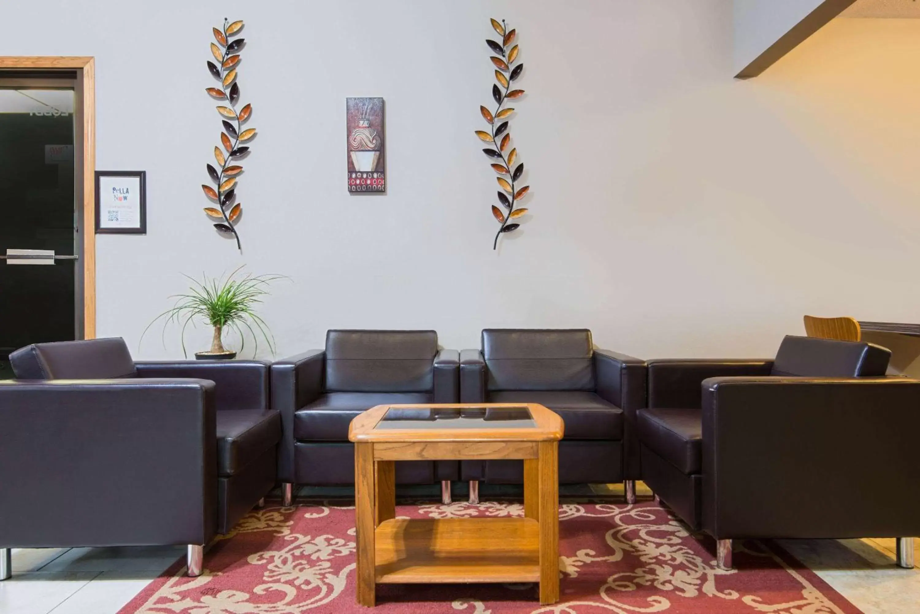 Lobby or reception in Super 8 by Wyndham Pella Lobby or reception in Super 8 by Wyndham Pella