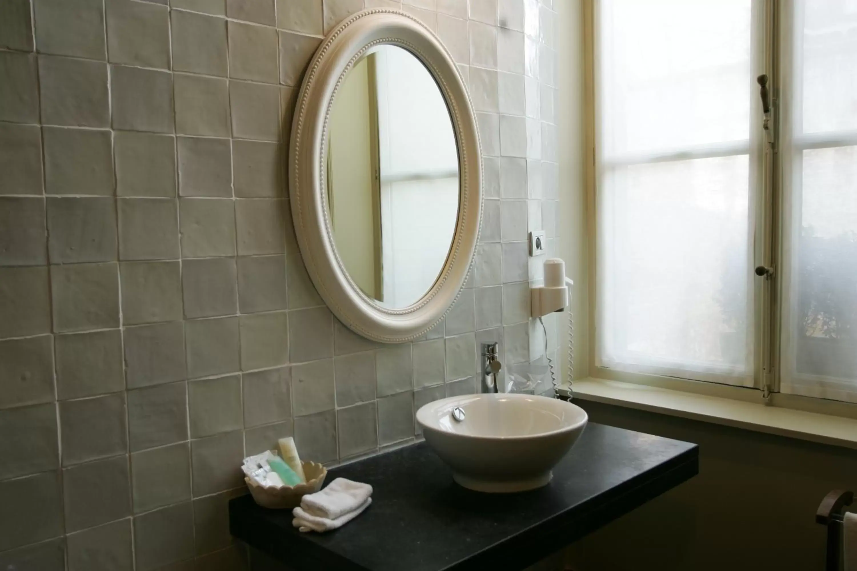 Decorative detail, Bathroom in Hotel Jan Brito