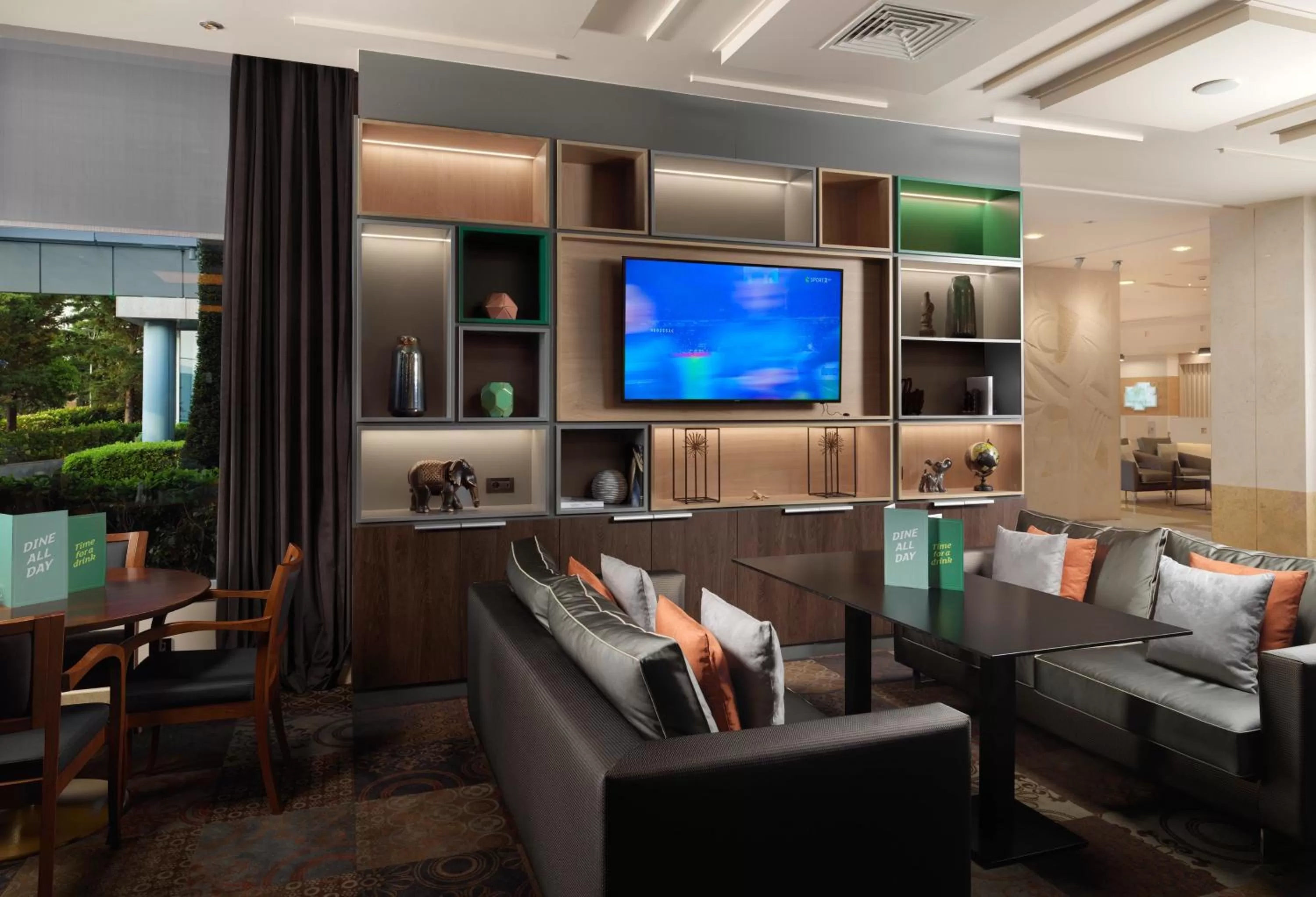 Lounge or bar in Holiday Inn Athens Attica Av, Airport W. by IHG