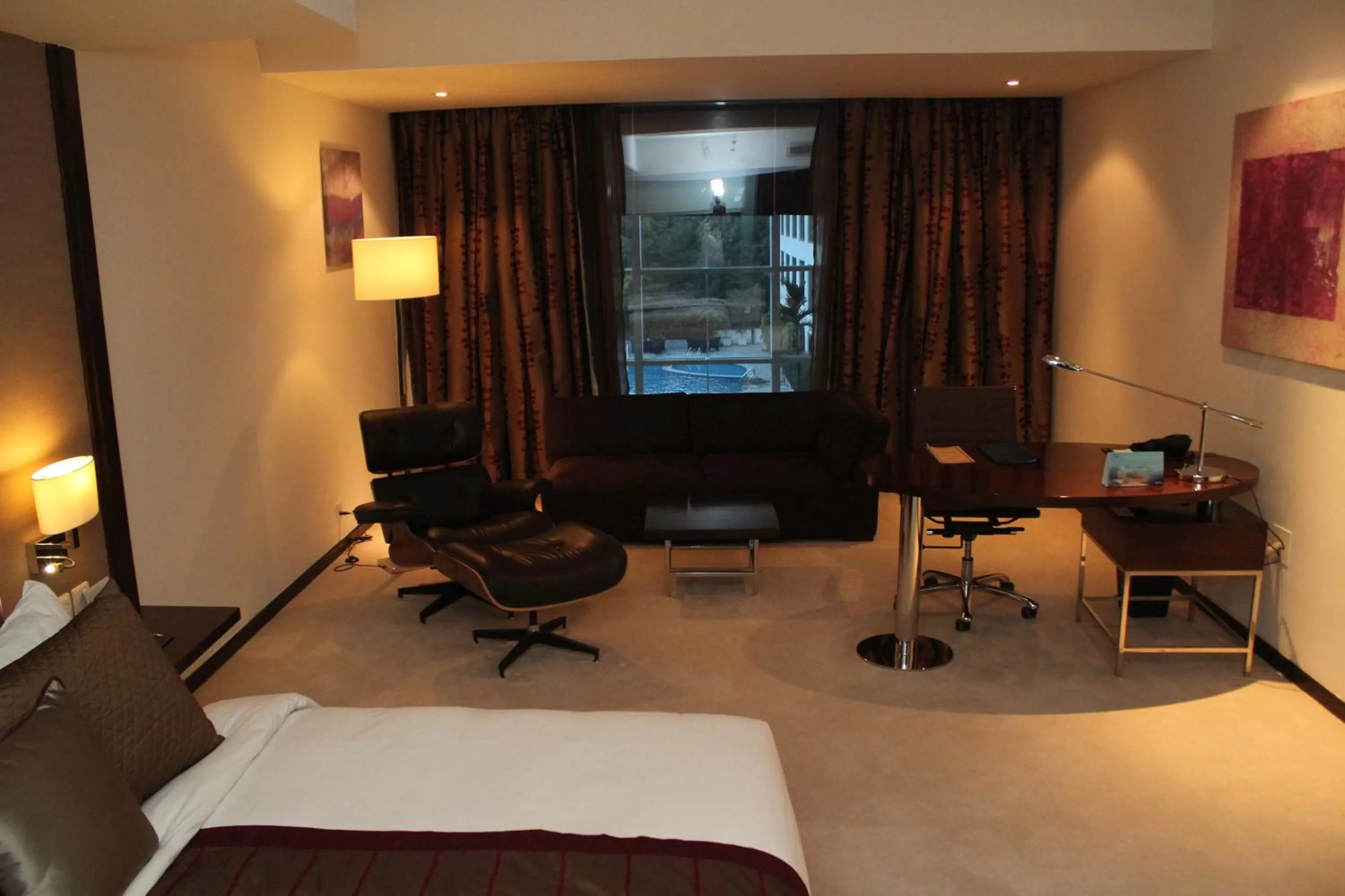 View (from property/room), Bed in Radisson Blu Plaza Hotel Hyderabad Banjara Hills