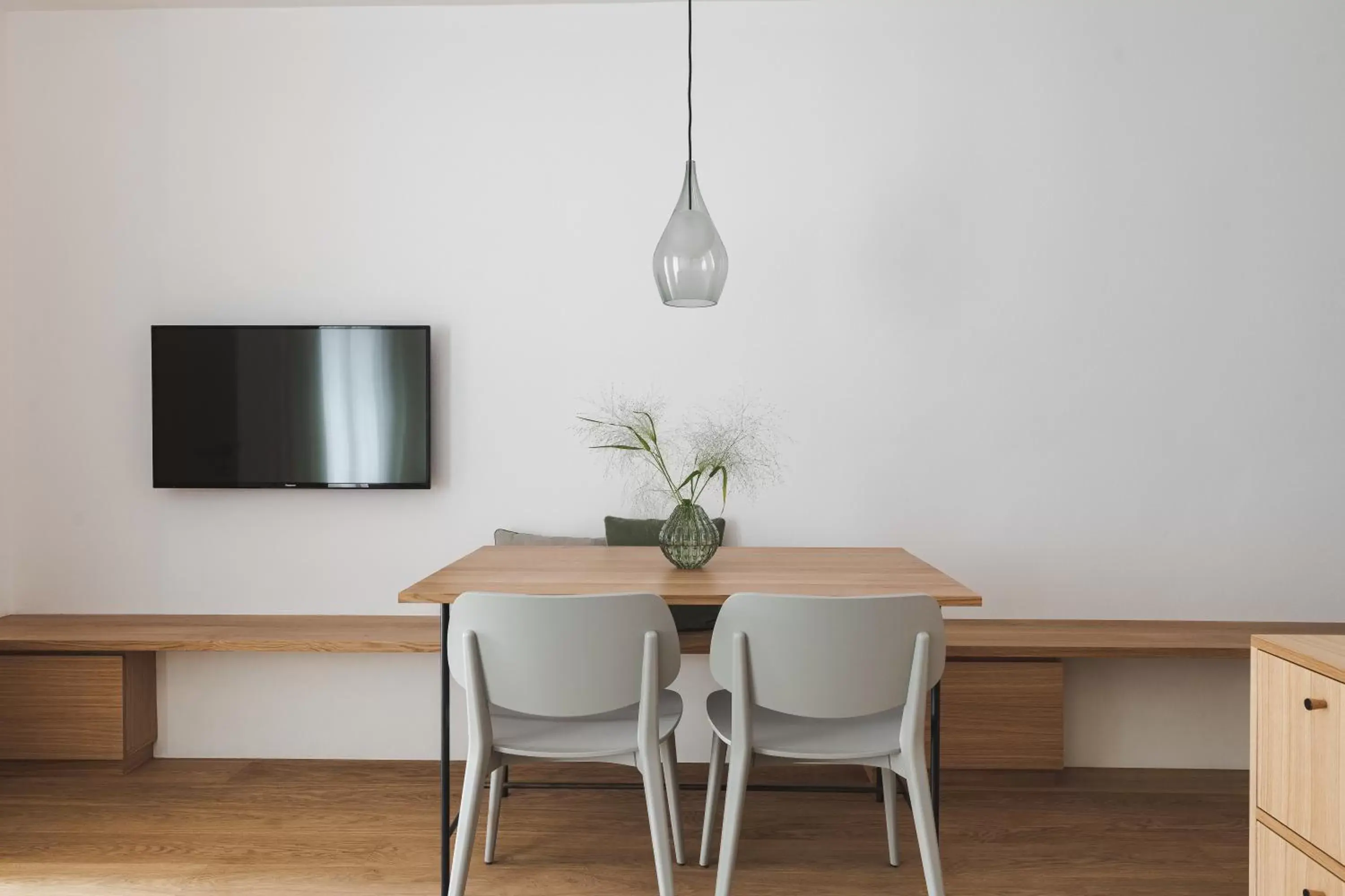 Dining area, TV/Entertainment Center in Kuntino Suites