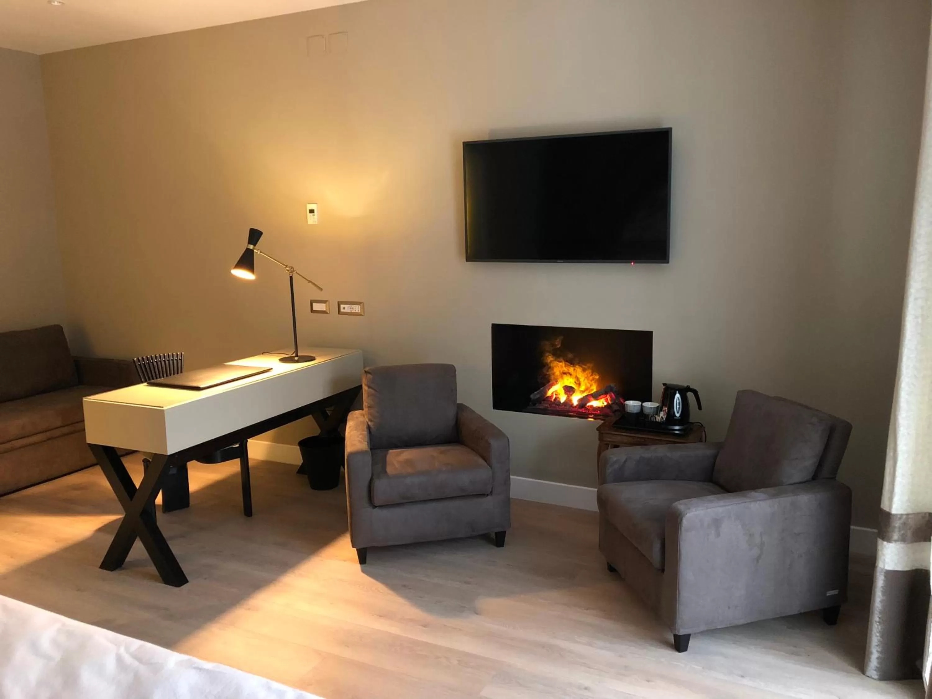 Seating area in Caruso Place Luxury Rooms & Suites