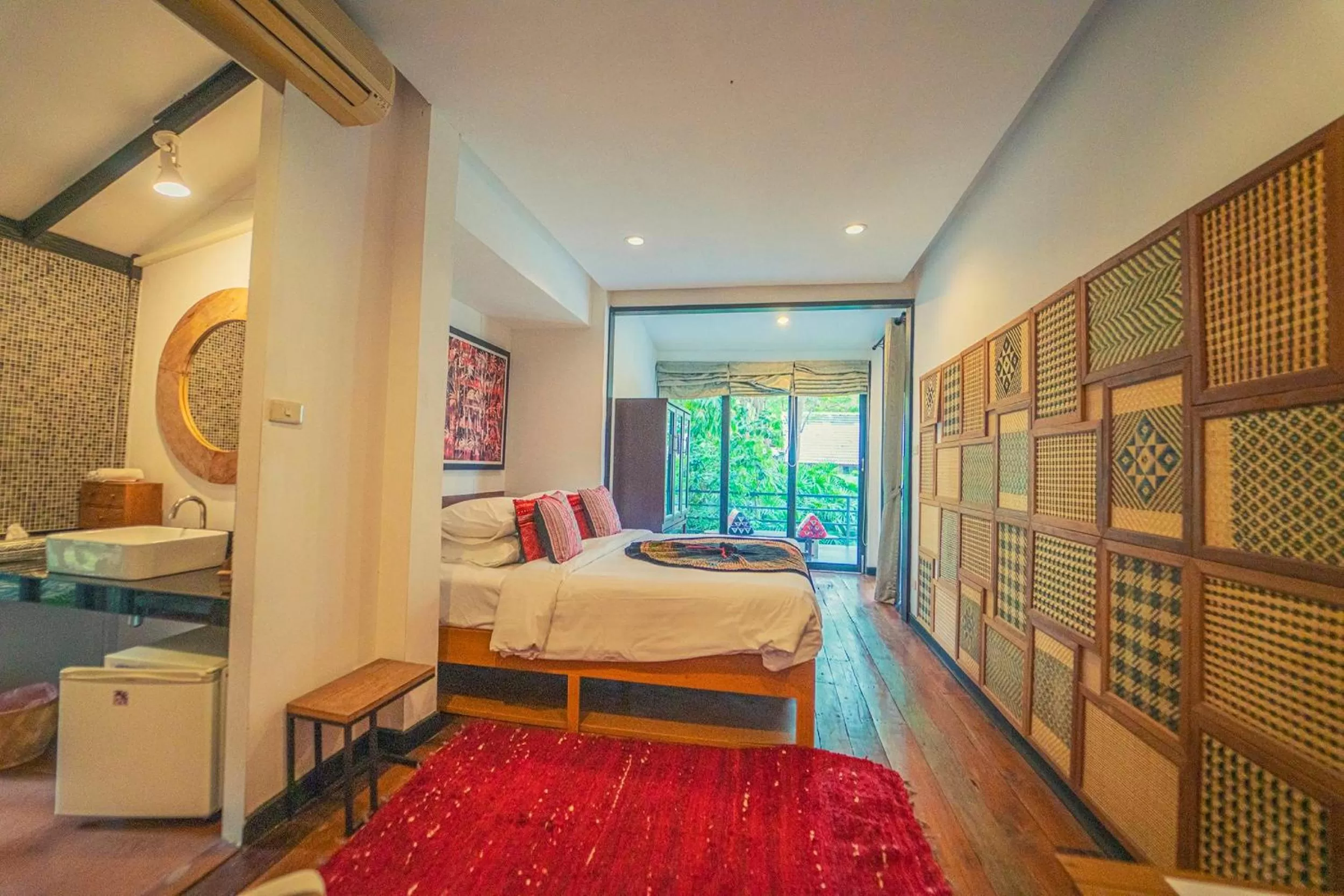 Photo of the whole room, Bed in Baan Suan Residence เฮือนพักบ้านสวน