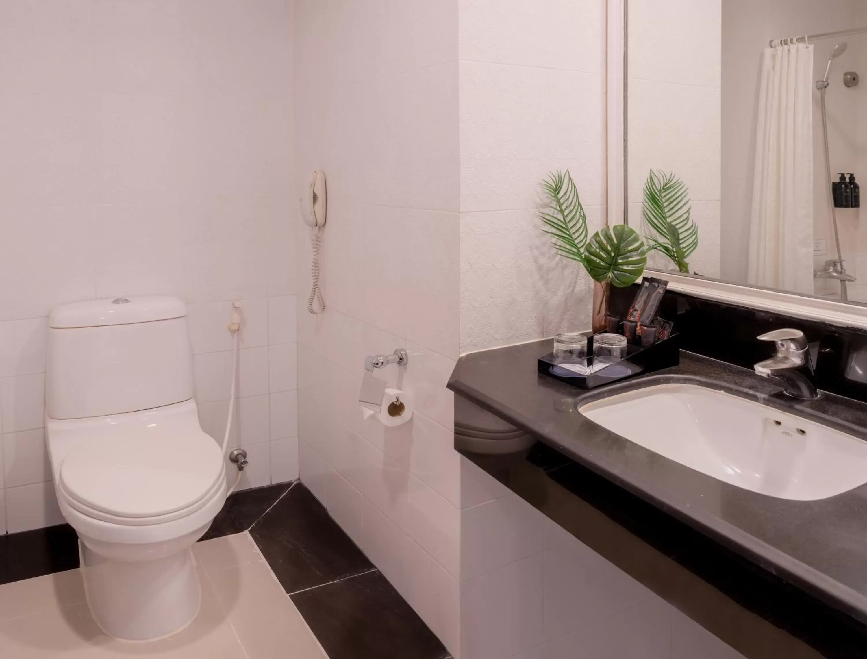 Bathroom in FuramaXclusive Sukhumvit Bathroom in FuramaXclusive Sukhumvit