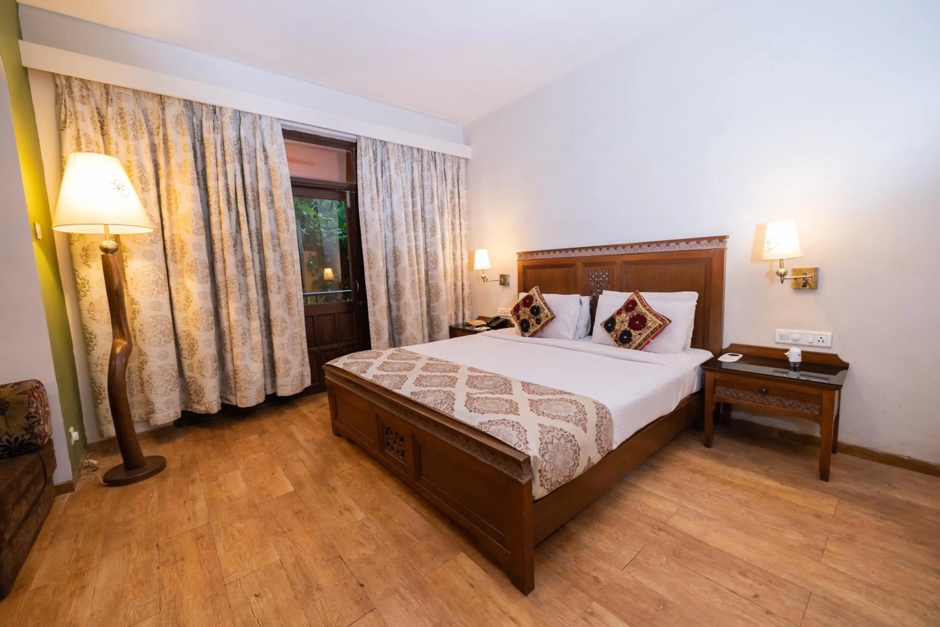 Bed in Neelam's The Grand Hotel Goa