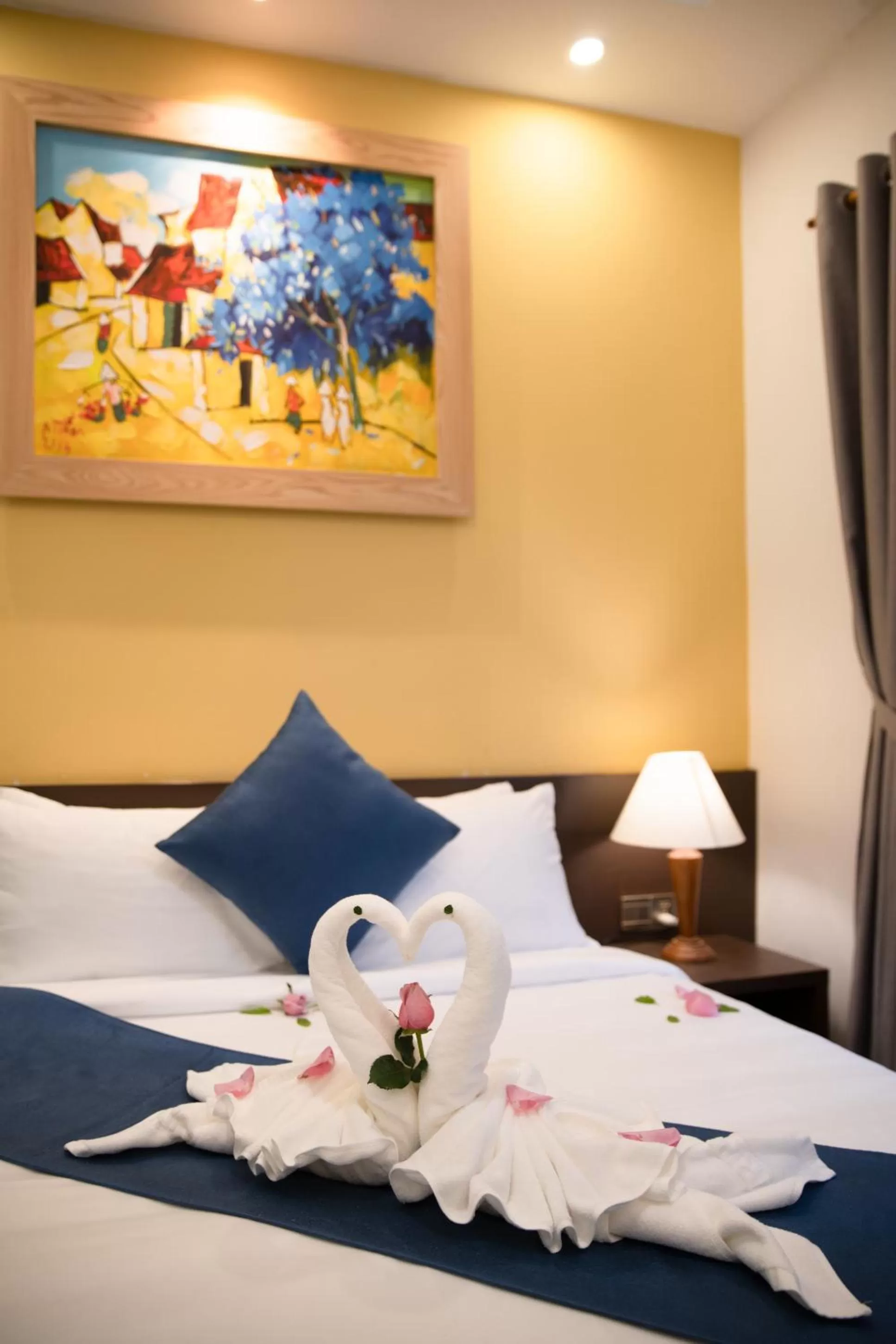 Decorative detail, Bed in TRIPLE Riverside Villa Hotel HoiAn