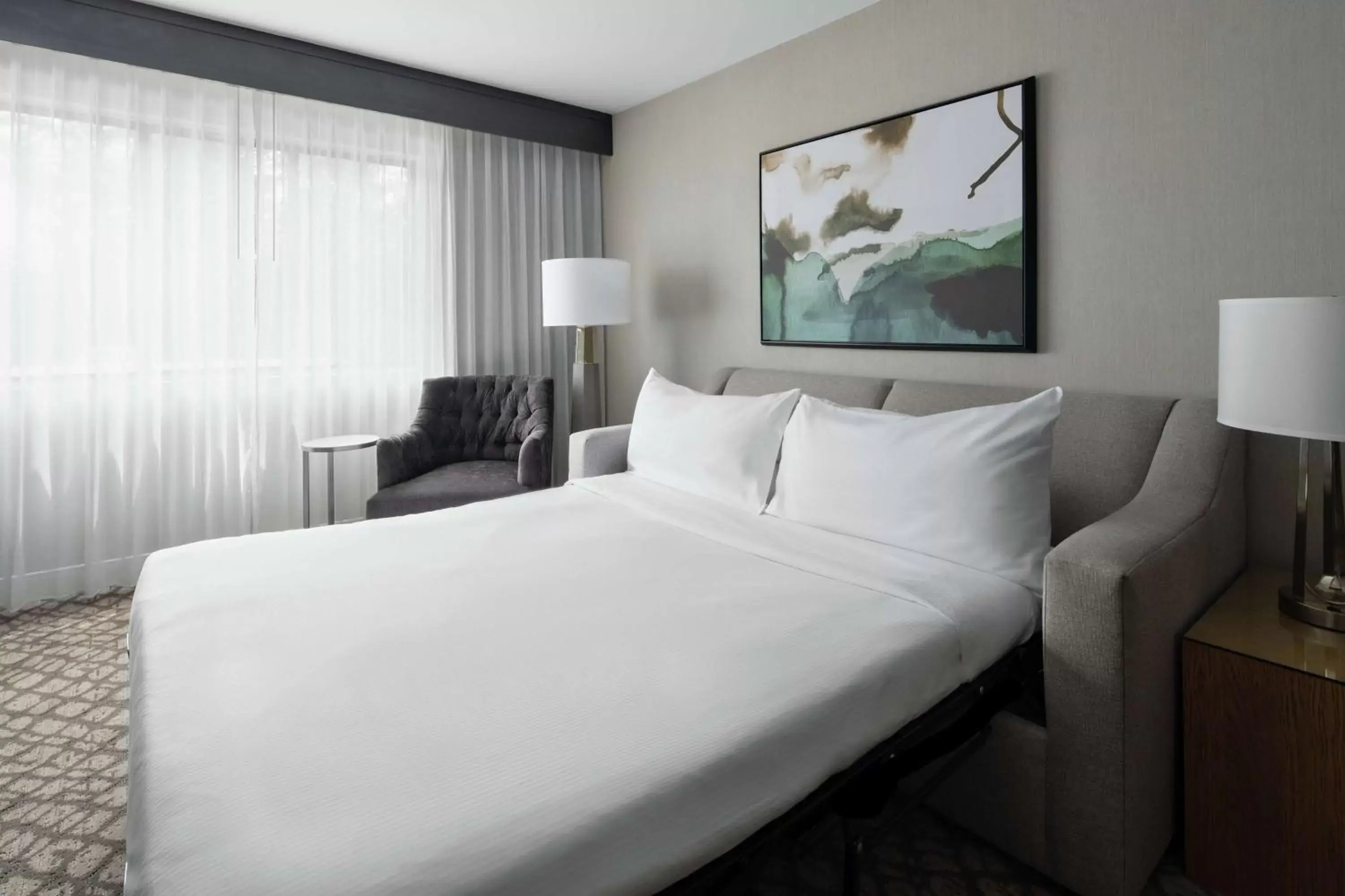 Bed in DoubleTree Suites by Hilton Charlotte/SouthPark