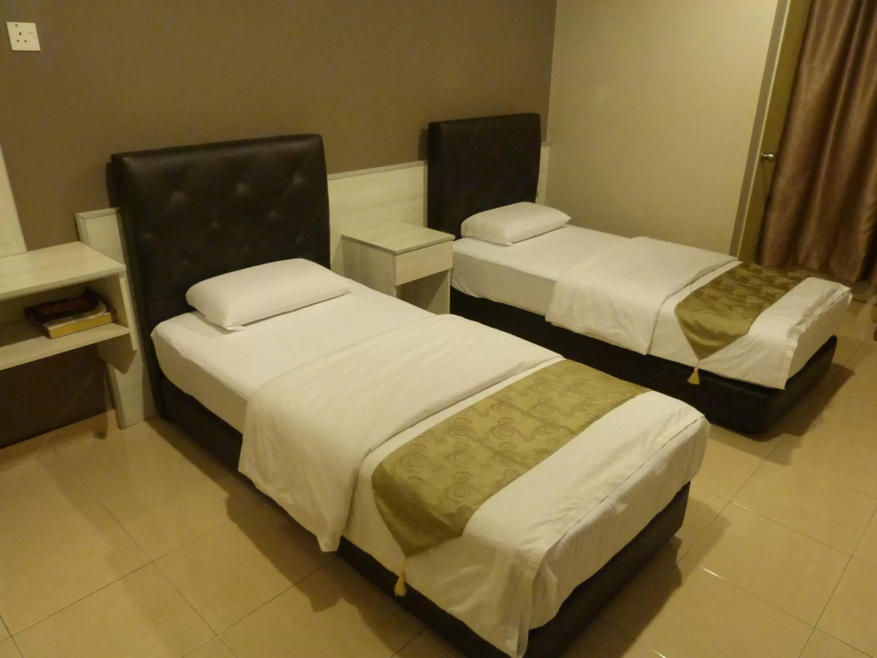 Bed in AERO Star Hotel